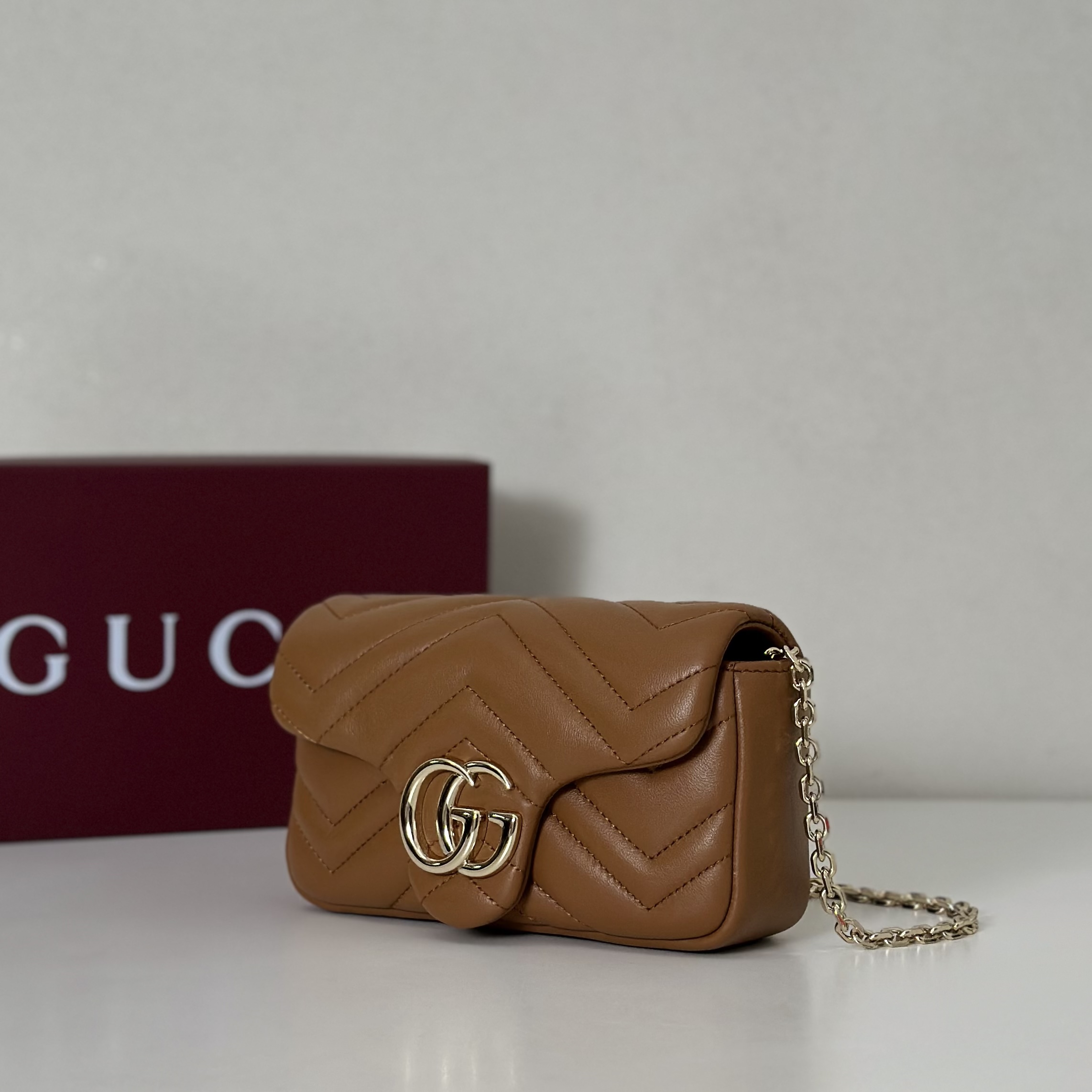 Gucci GG Marmont mini shoulder bag in brown leather | GUCCI