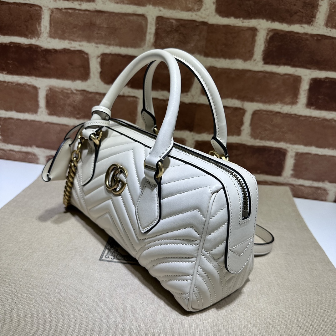 Gucci  GG Marmont small top handle bag in white leather | GUCCI