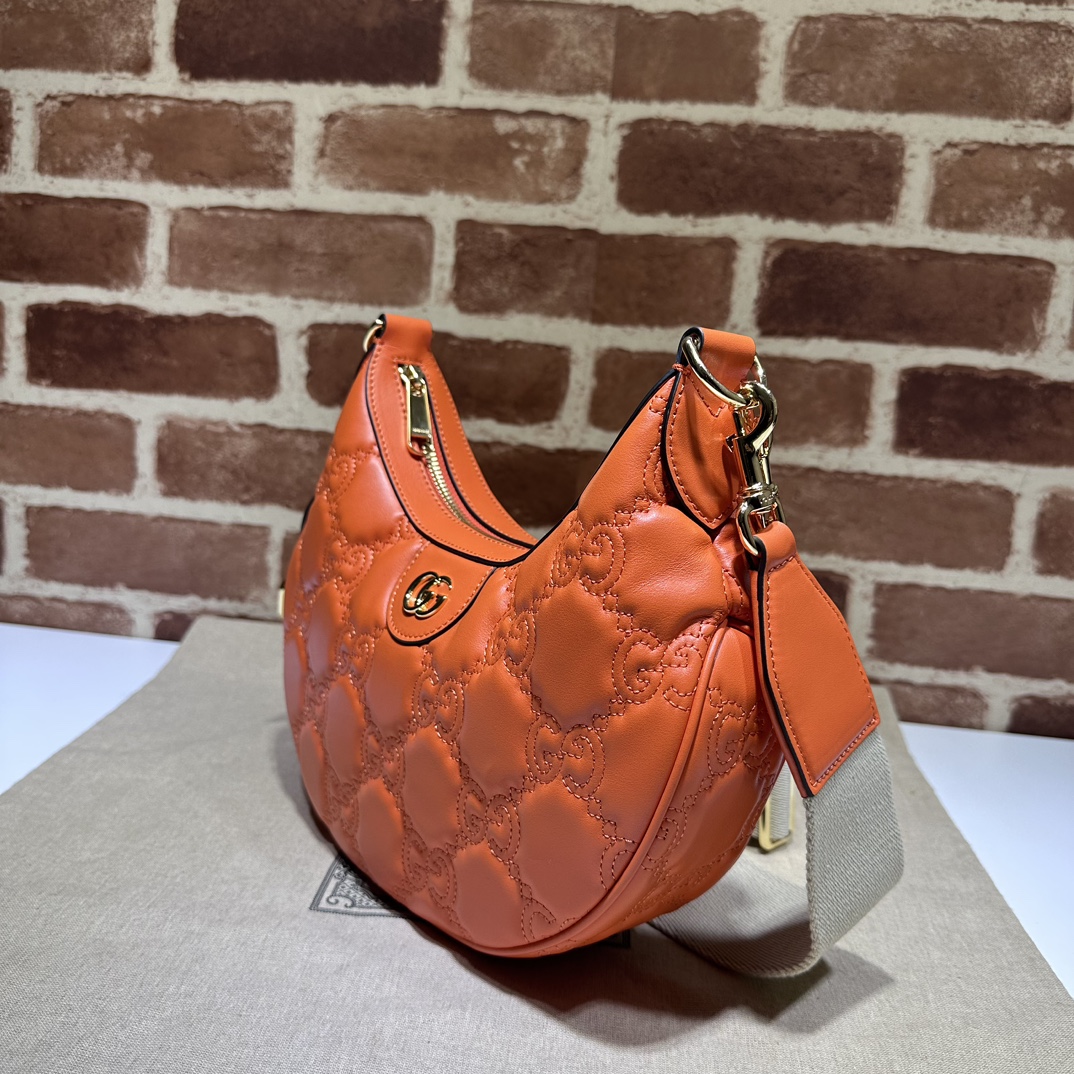 Gucci GG Matelassé small shoulder bag in orange leather