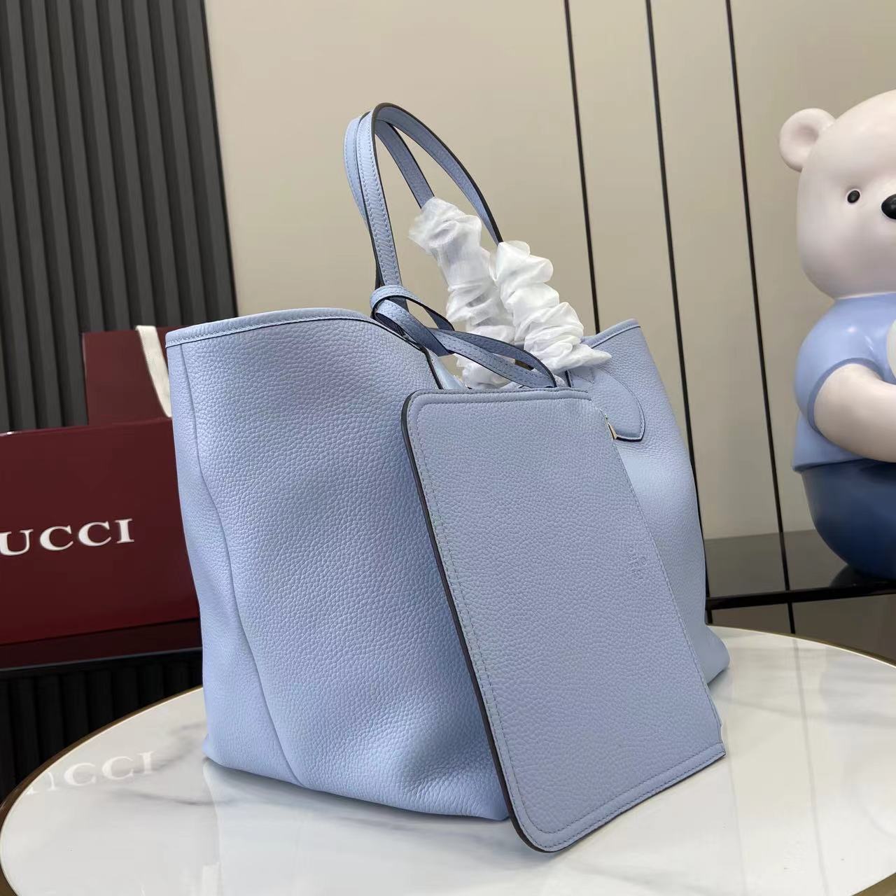 GUCCI Gucci Totissima small reversible tote bag in light blue leather