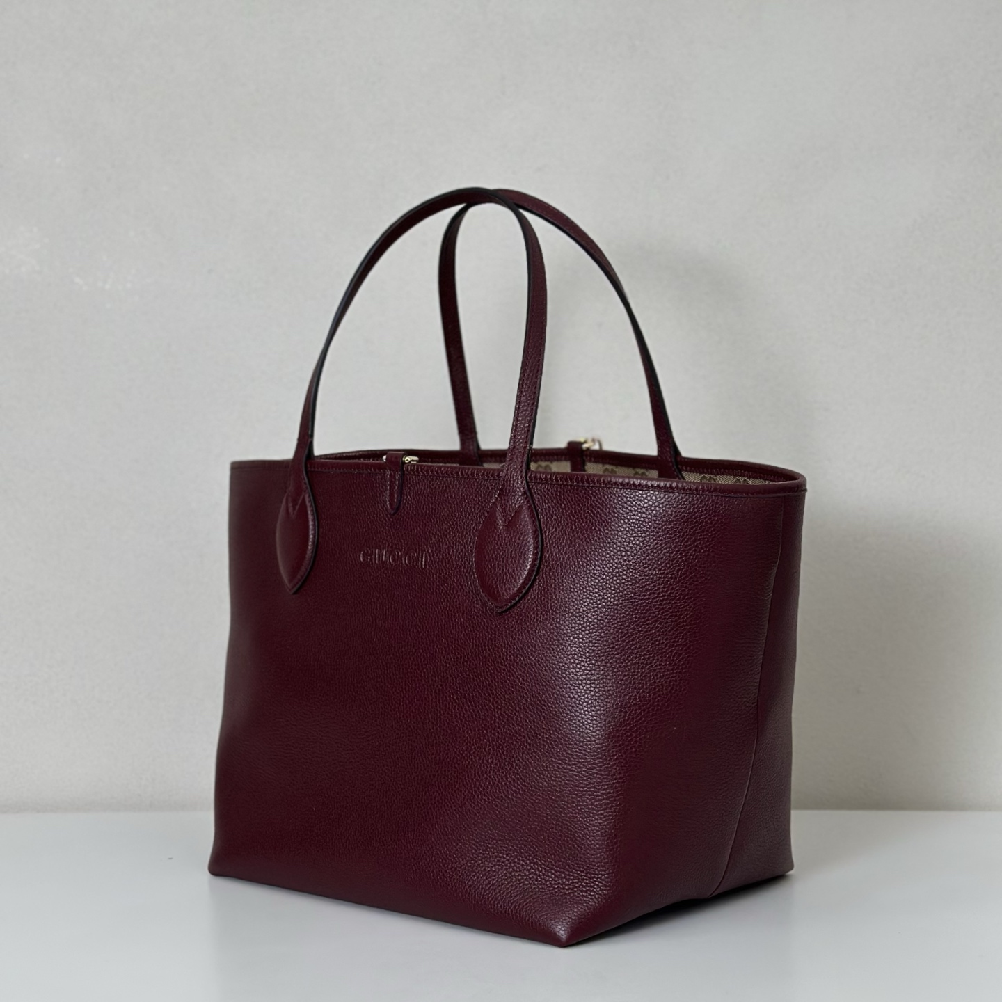 Gucci Gucci Totissima small reversible tote bag in Rosso Ancora red leather | GUCCI