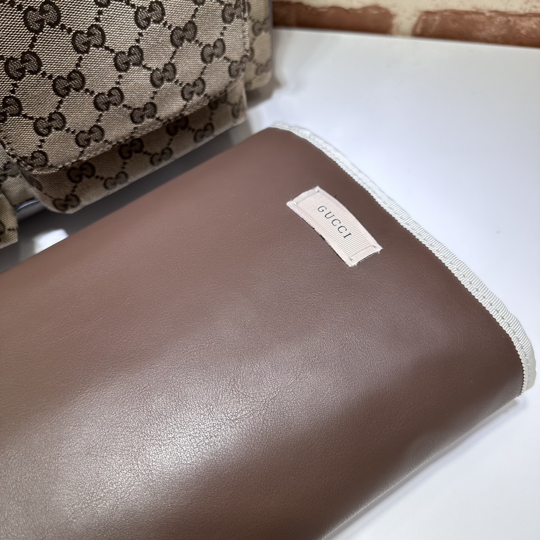 gucci Large changing bag in beige and dark brown GG canvas