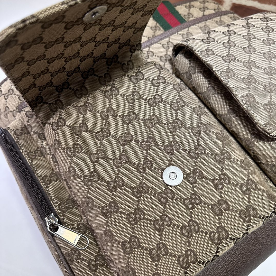 gucci Large changing bag in beige and dark brown GG canvas