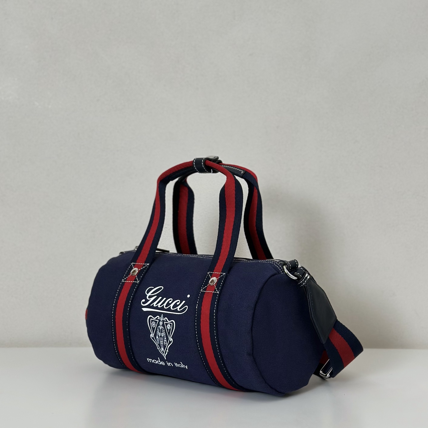 Gucci Large printed canvas duffle bag in dark blue canvas | GUCCI