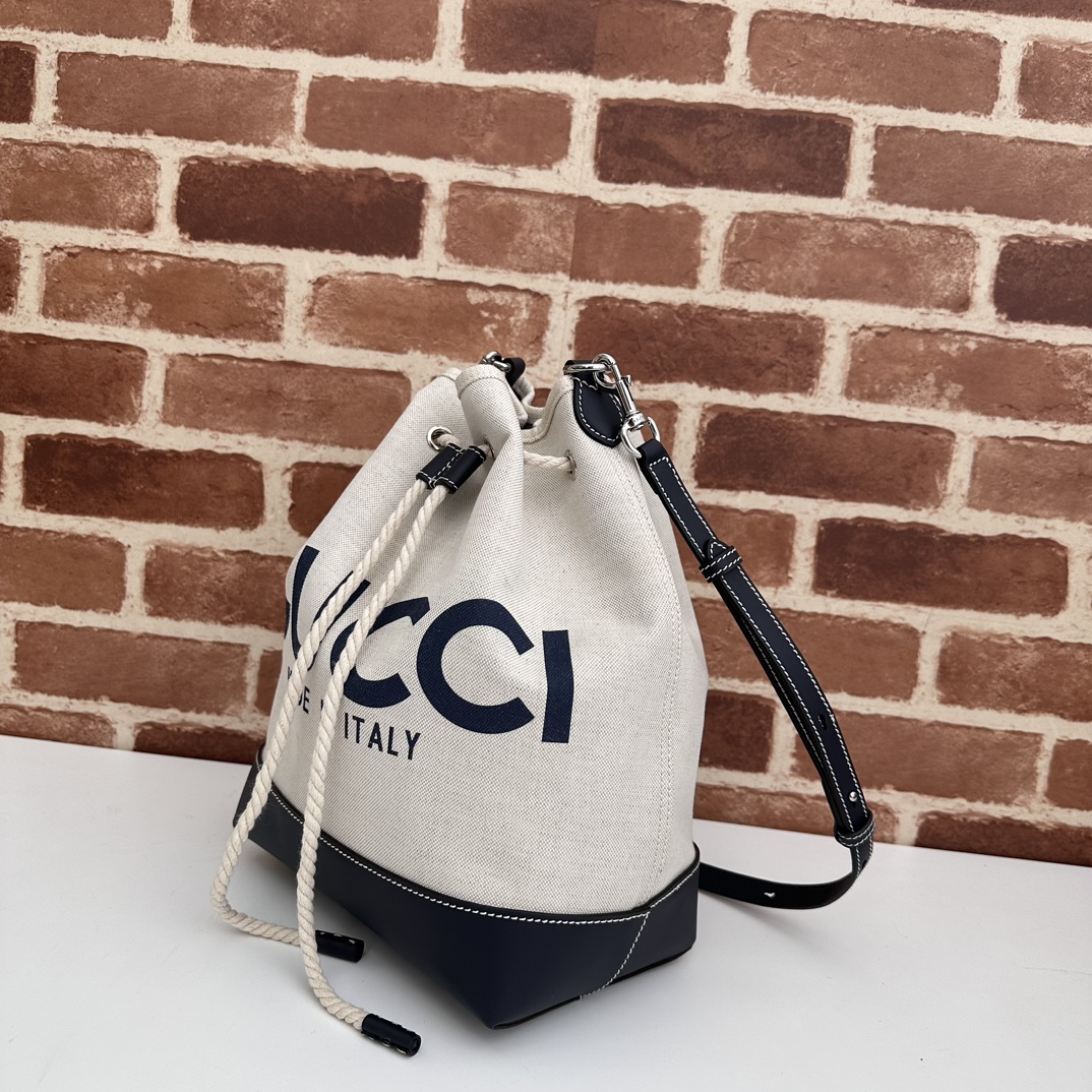 GUCCI Logo leather-trimmed canvas bucket black white bag