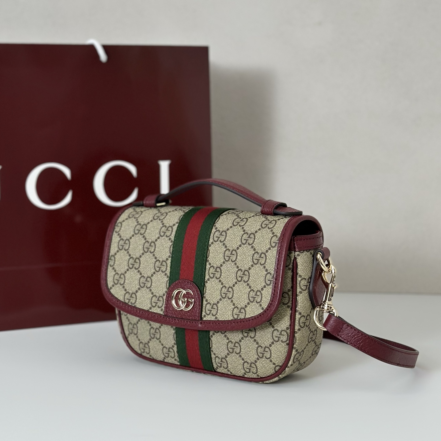 Gucci Petit sac à main Ophidia en tissu GG beige et marron