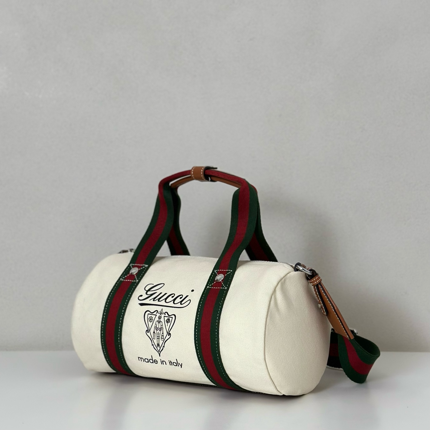 Gucci Small printed canvas duffle bag in off white canvas | GUCCI