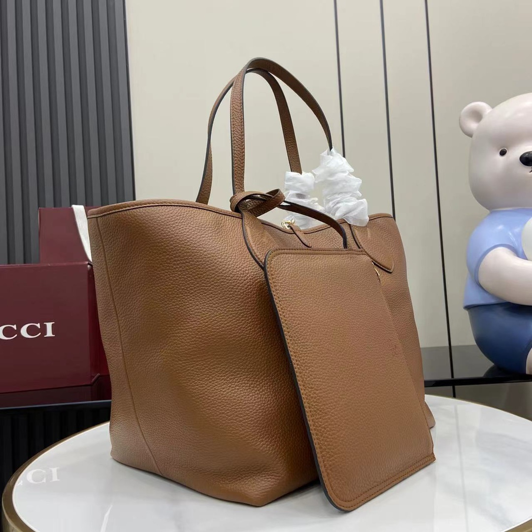 Gucci Totissima small reversible tote bag in brown leather