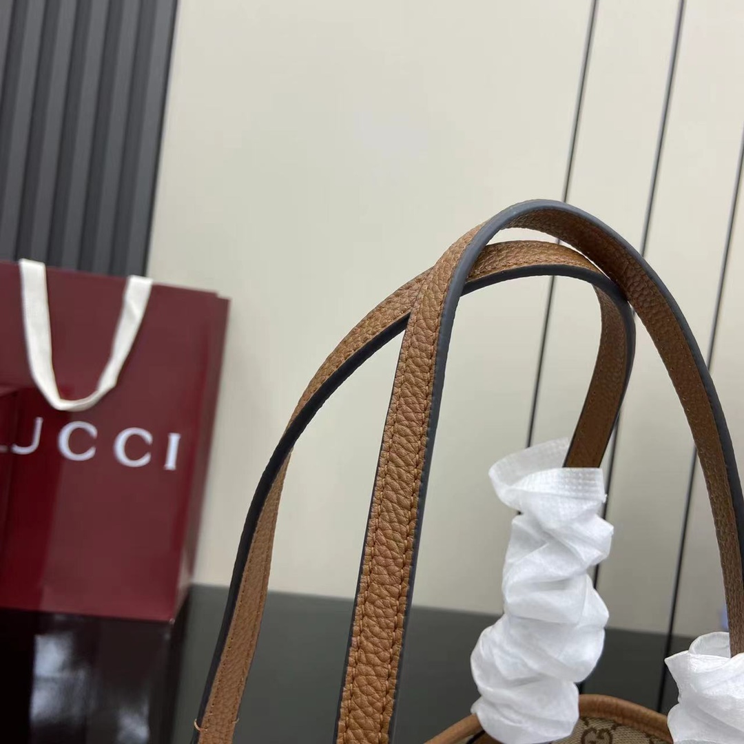 Gucci Totissima small reversible tote bag in brown leather