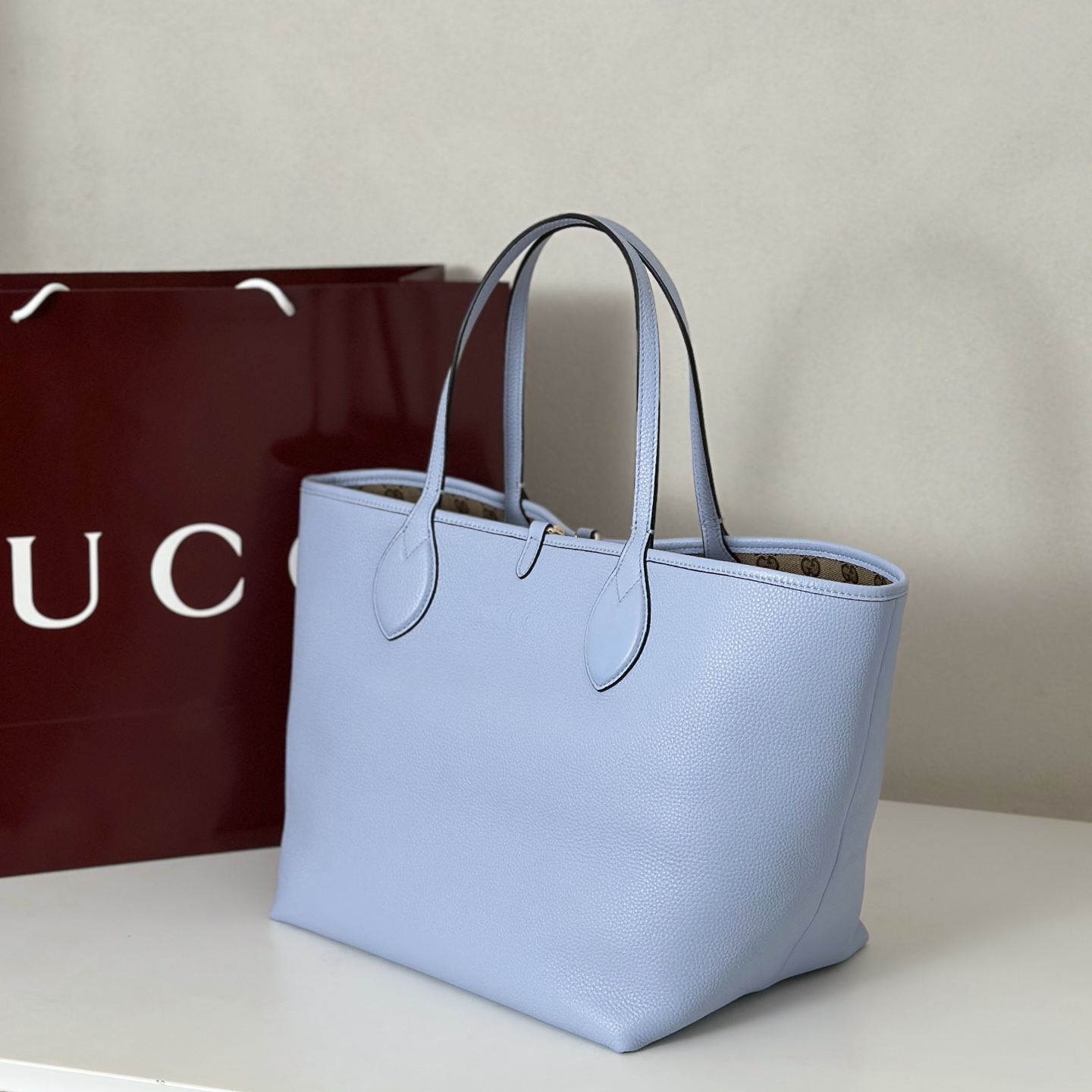 Gucci Totissima small reversible tote bag in light blue leather |