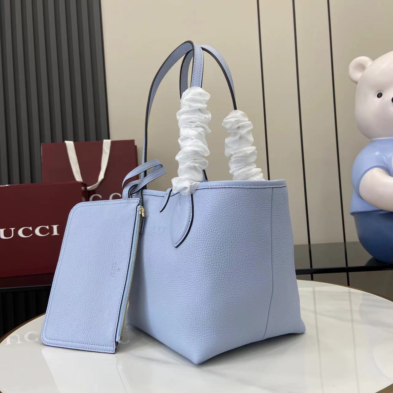 Gucci Totissima small reversible tote bag in light blue leather