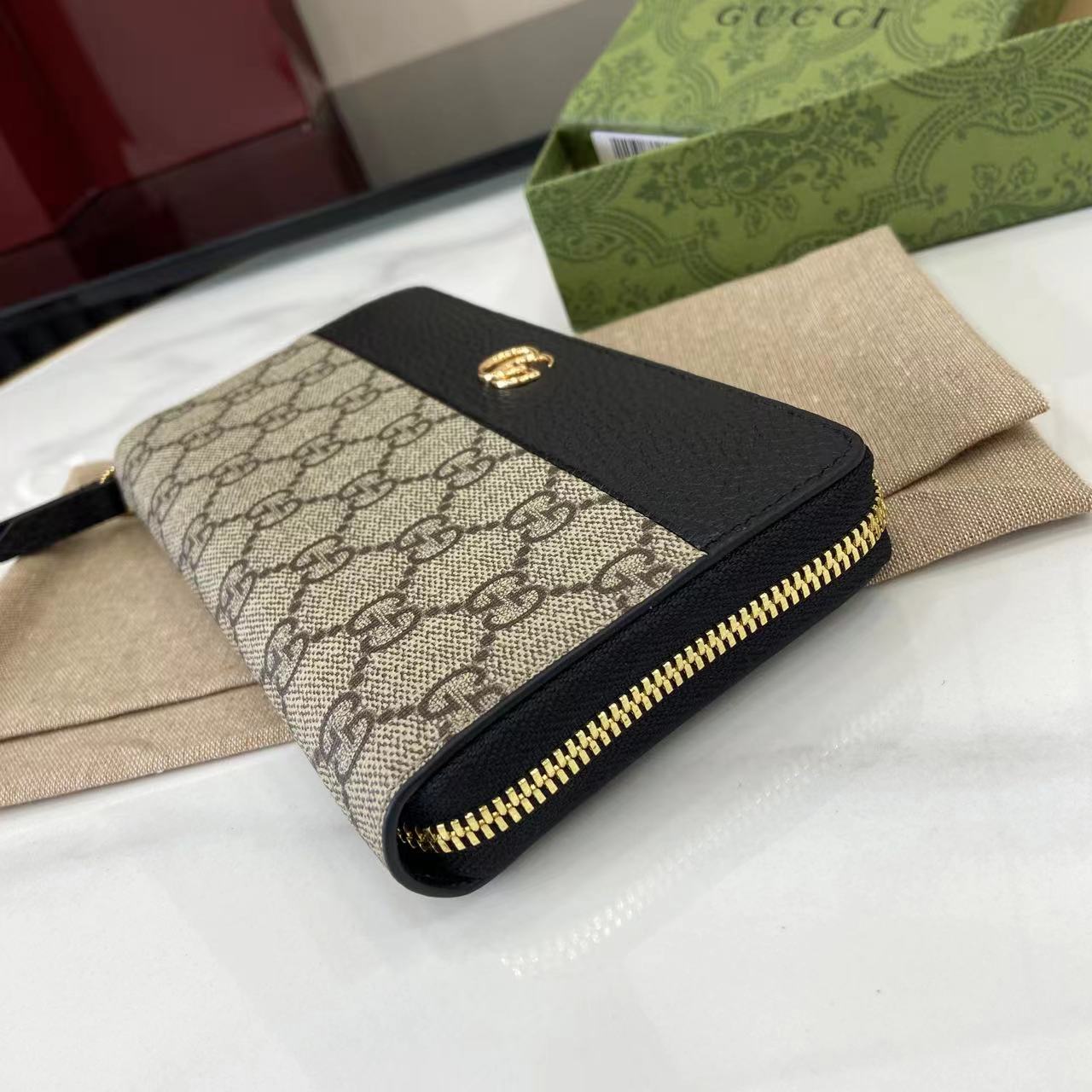 GucciG Marmont bi-color zip around wallet in beige and blue