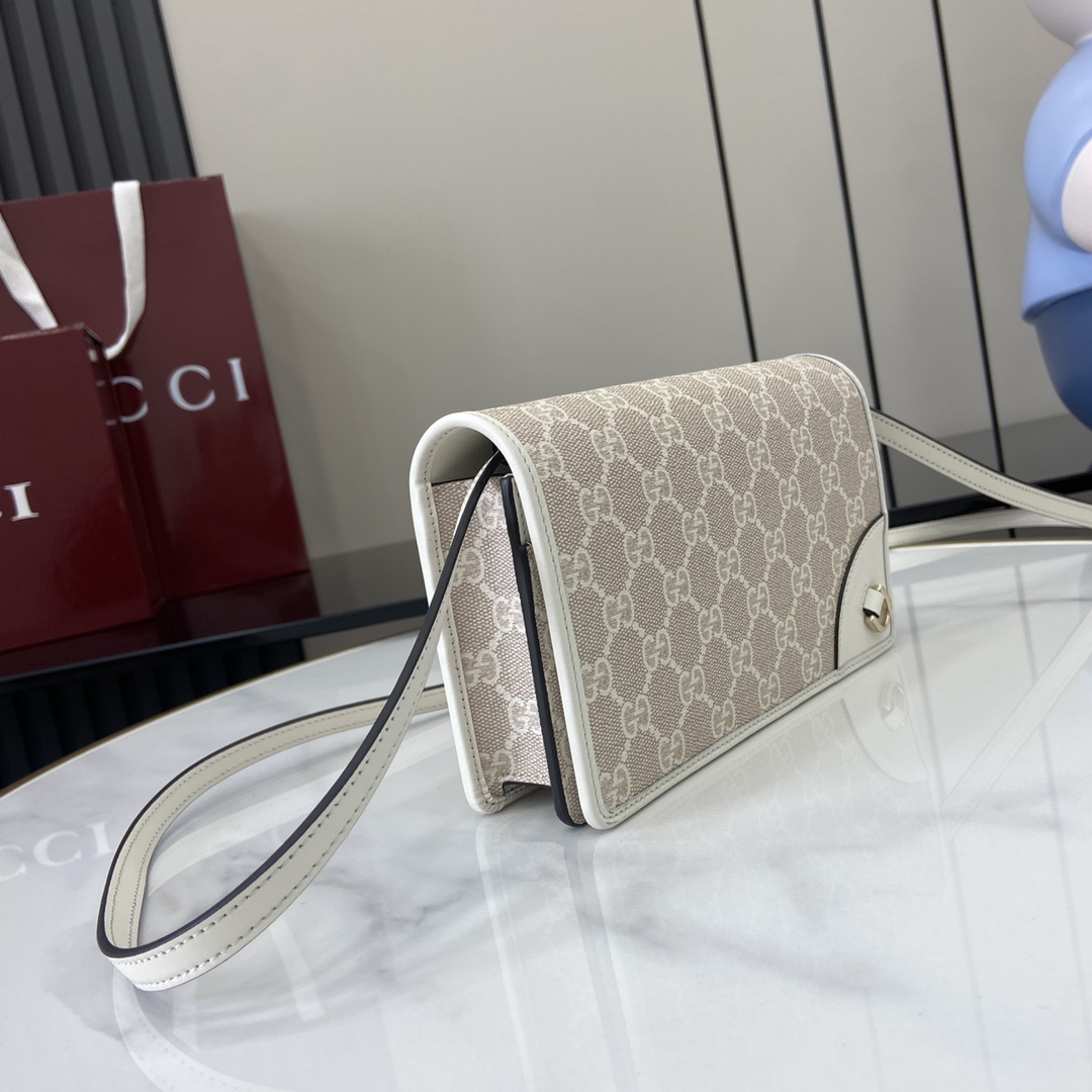 GucciGG Emblem wallet with leather strap in Beige GG Canvas | GUCCI SI