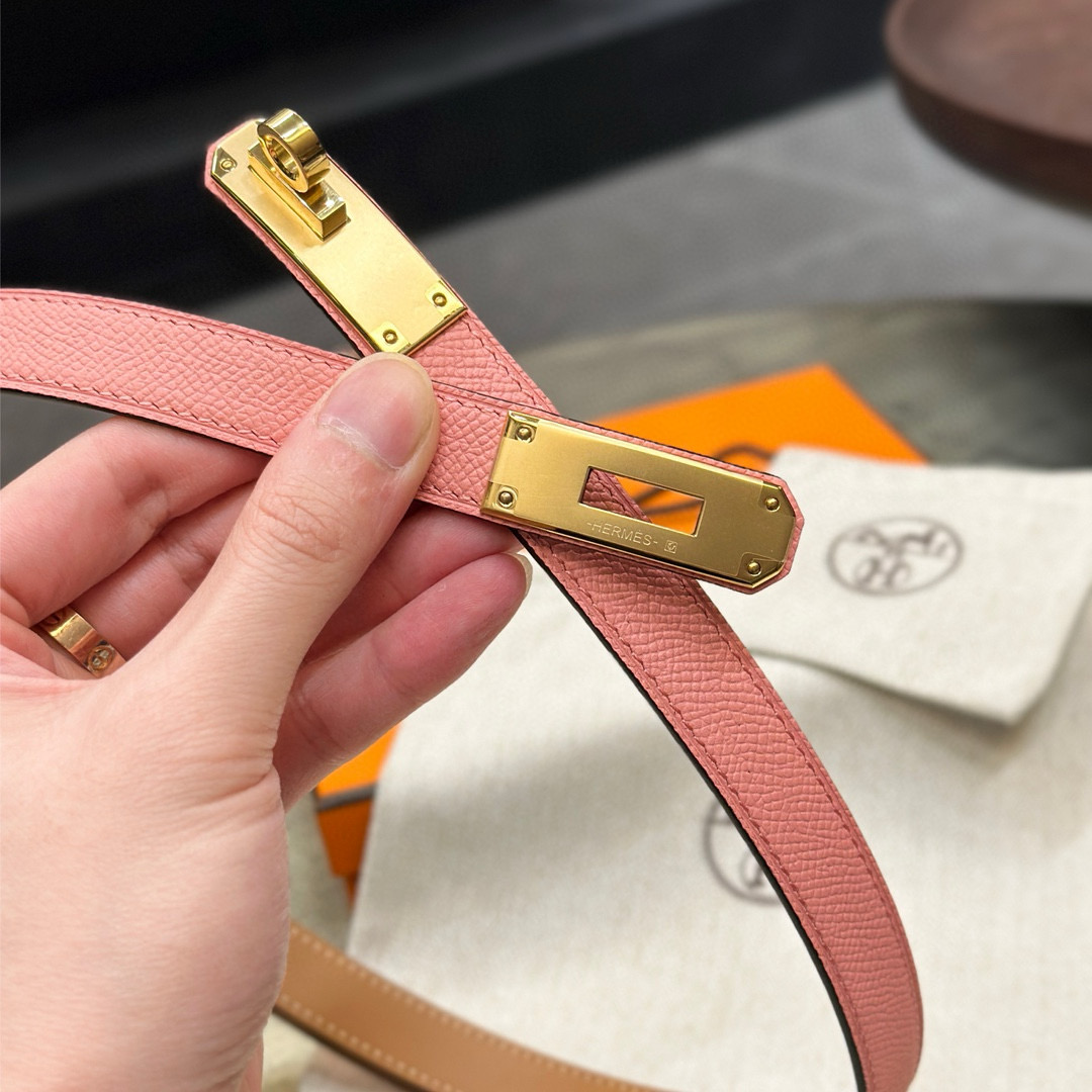 HermÃ¨s-Branded Pink Leather Belt with Gold Turn-Lock Buckle