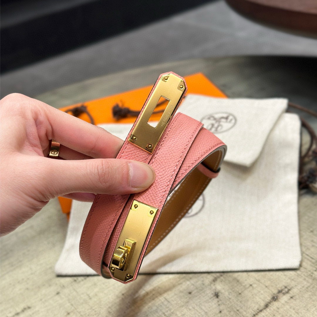 HermÃ¨s-Branded Pink Leather Belt with Gold Turn-Lock Buckle