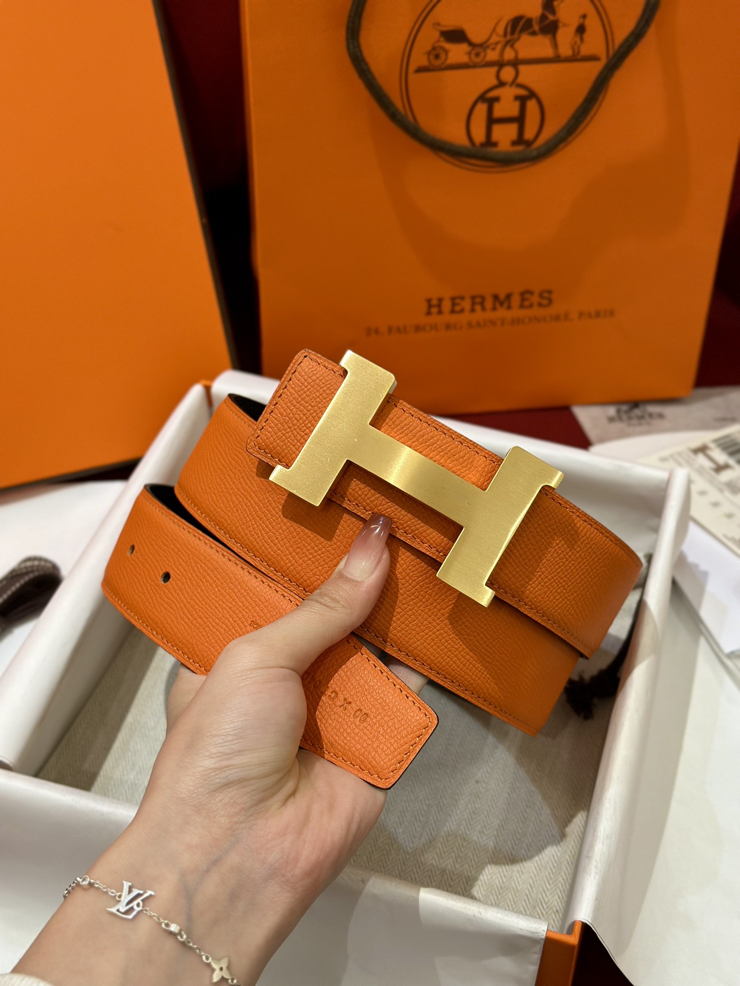 HermÃ¨s Gold Buckle Belt in Orange Togo Calf Leather