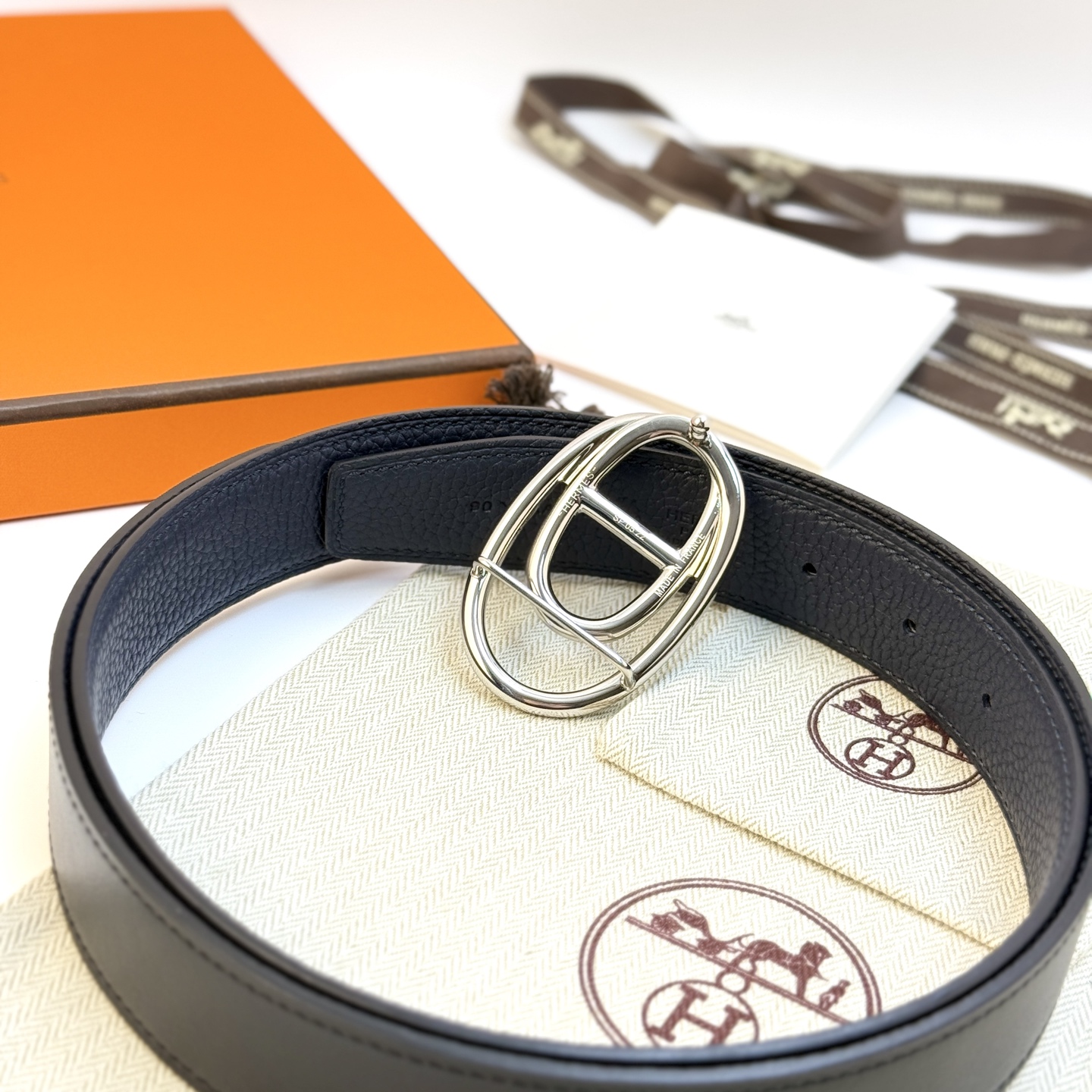 HermÃ¨s OdyssÃ©e Buckle Reversible Belt 32mm in Black and Navy Calfskin Leather with Palladium Finish