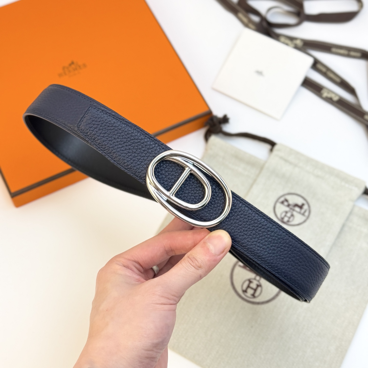 HermÃ¨s OdyssÃ©e Buckle Reversible Belt 32mm in Black and Navy Calfskin Leather with Palladium Finish