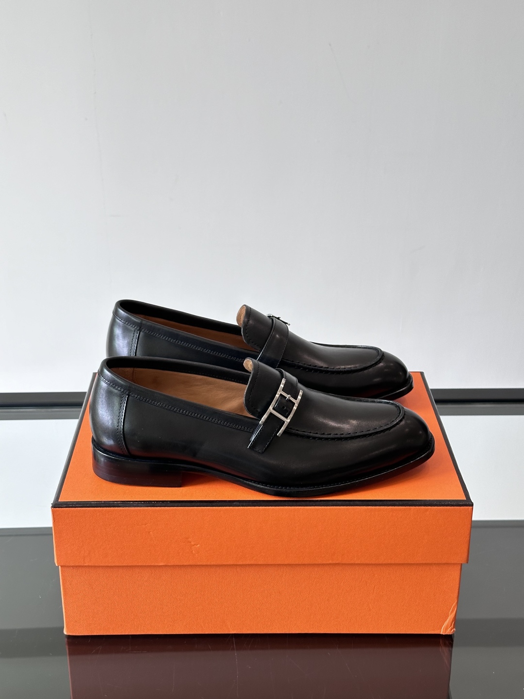 silver Hermès Shiny Black Leather Loafers