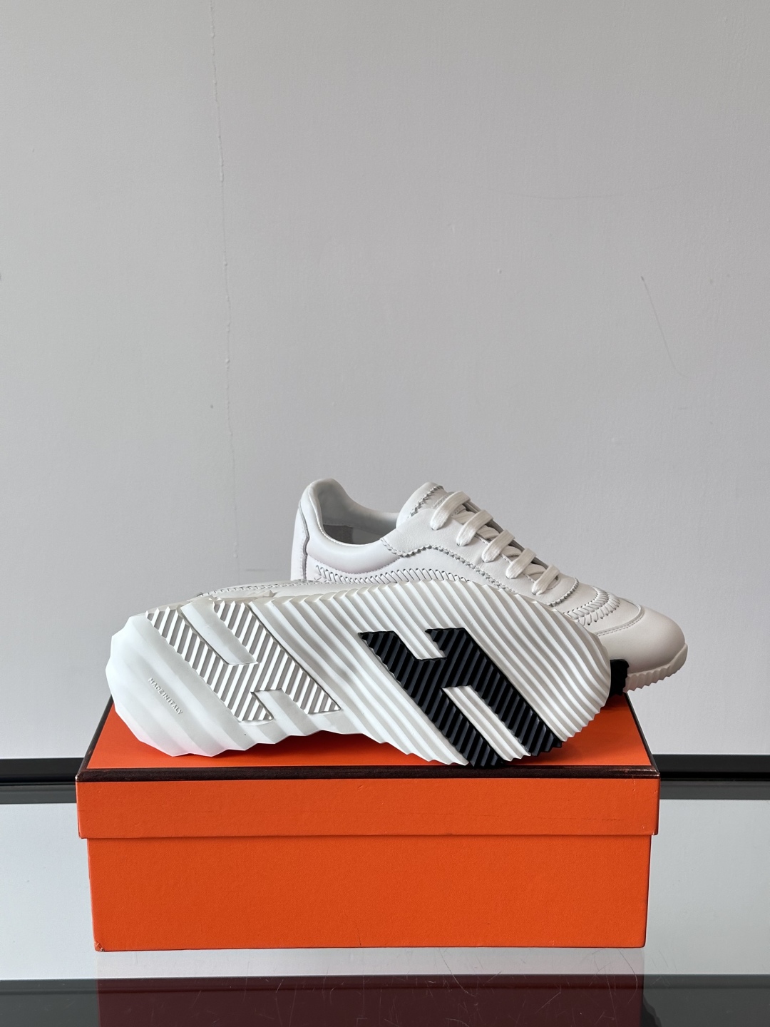 Hermes  Calfskin Herringbone Braided Bouncing Sneakers  White