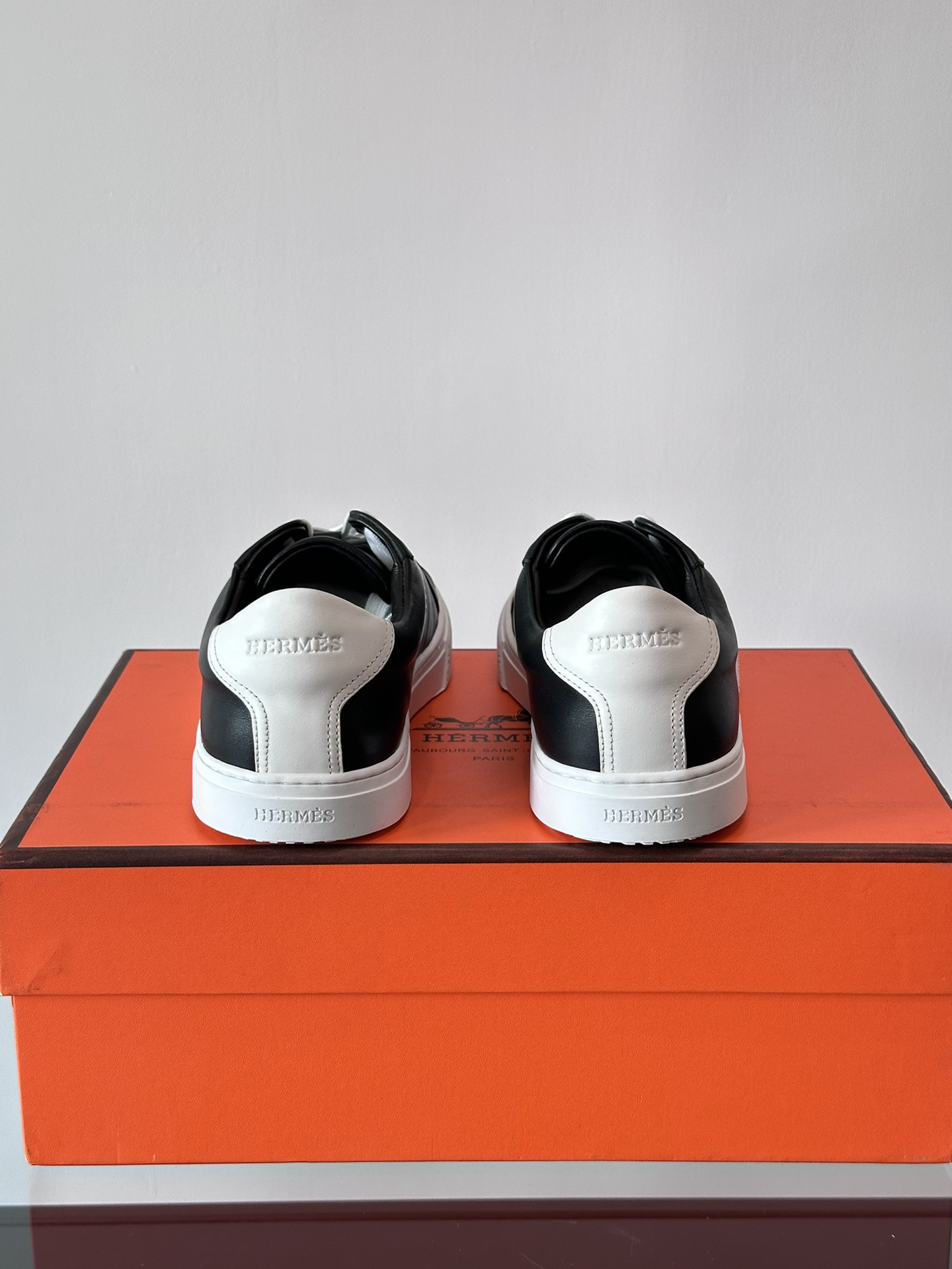 Hermes  Calfskin Mens Advantage Sneakers  Black White