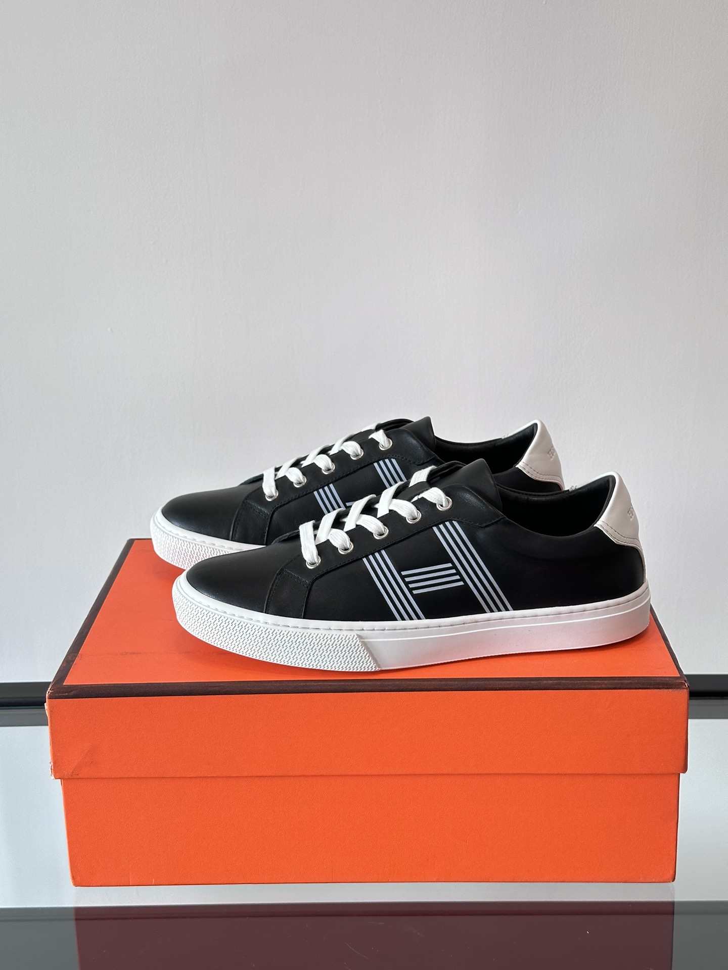 Hermes  Calfskin Mens Advantage Sneakers  Black White