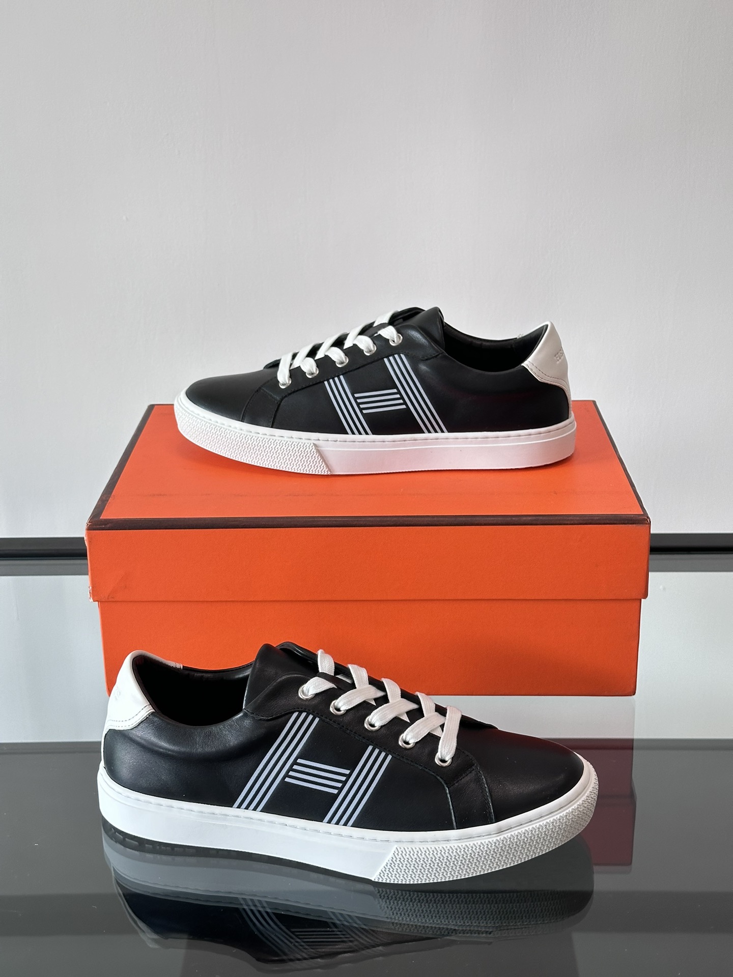 Hermes  Calfskin Mens Advantage Sneakers  Black White