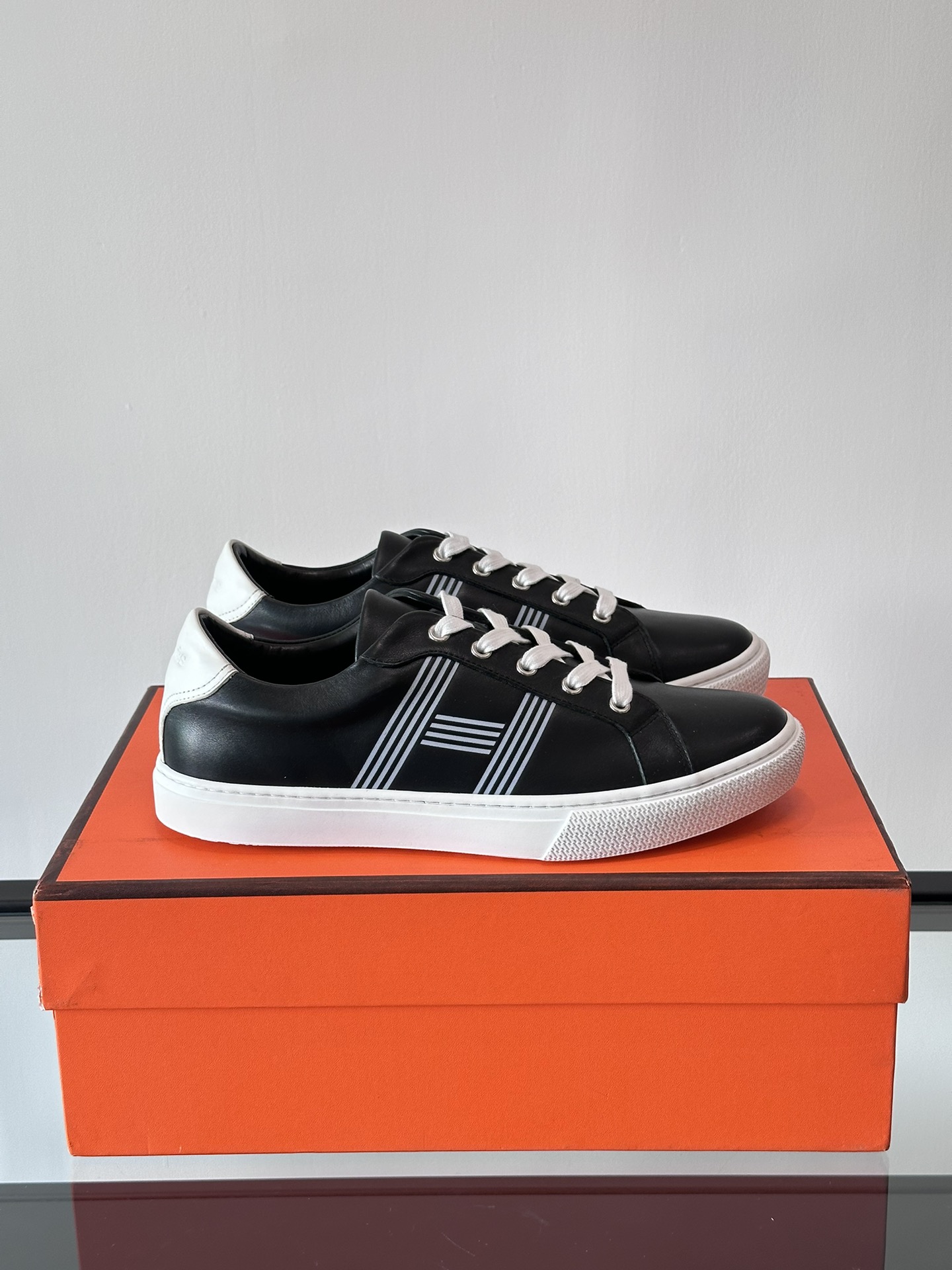 Hermes  Calfskin Mens Advantage Sneakers  Black White