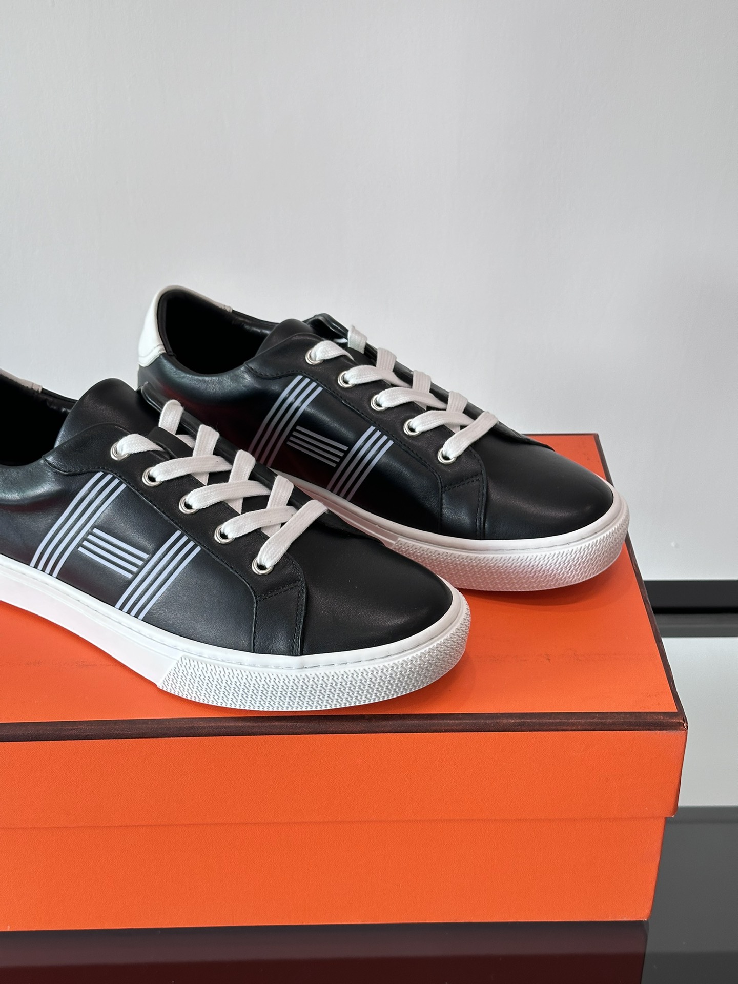 Hermes  Calfskin Mens Advantage Sneakers  Black White