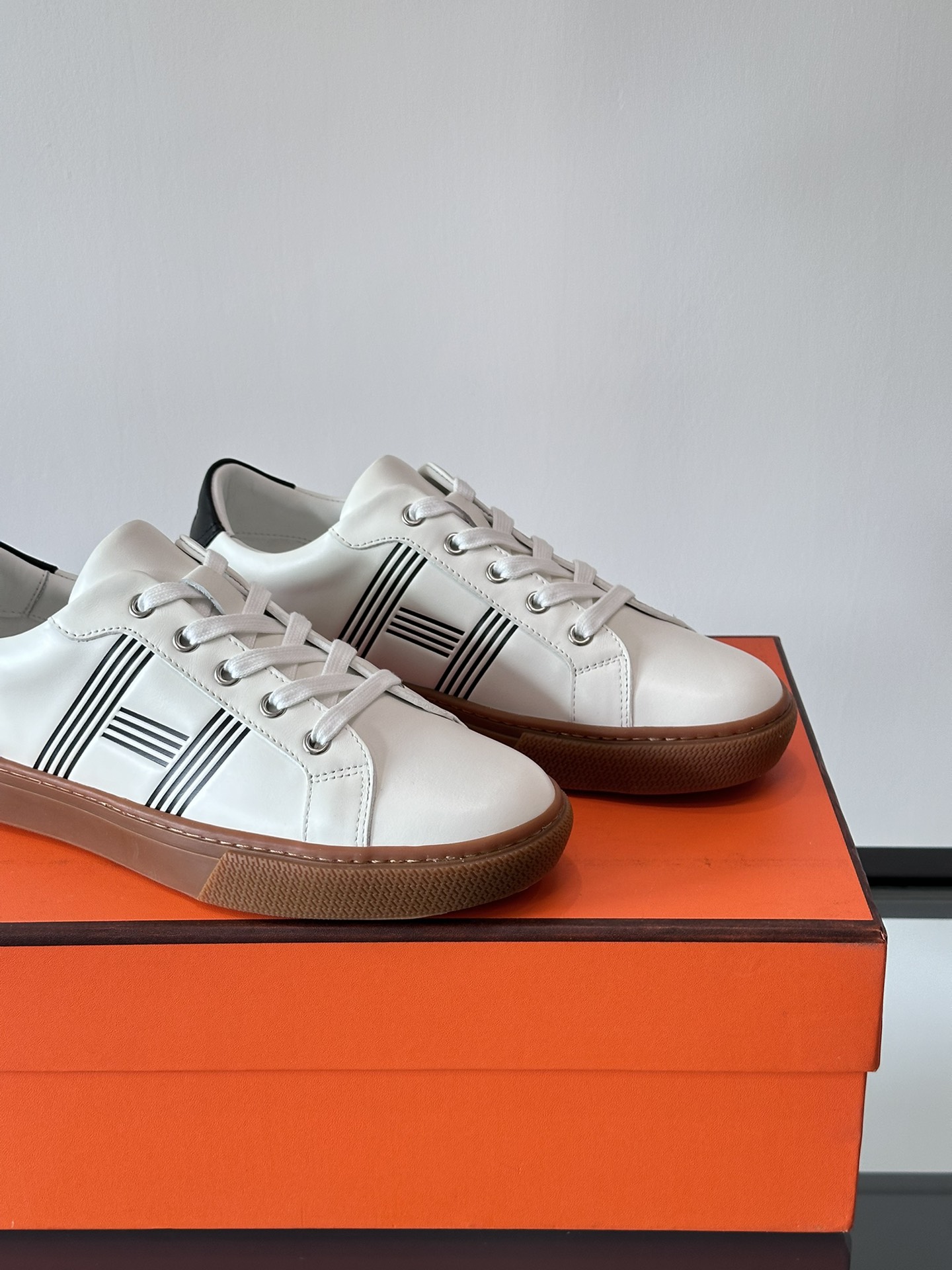 Hermes  Calfskin Mens Advantage Sneakers  White Black