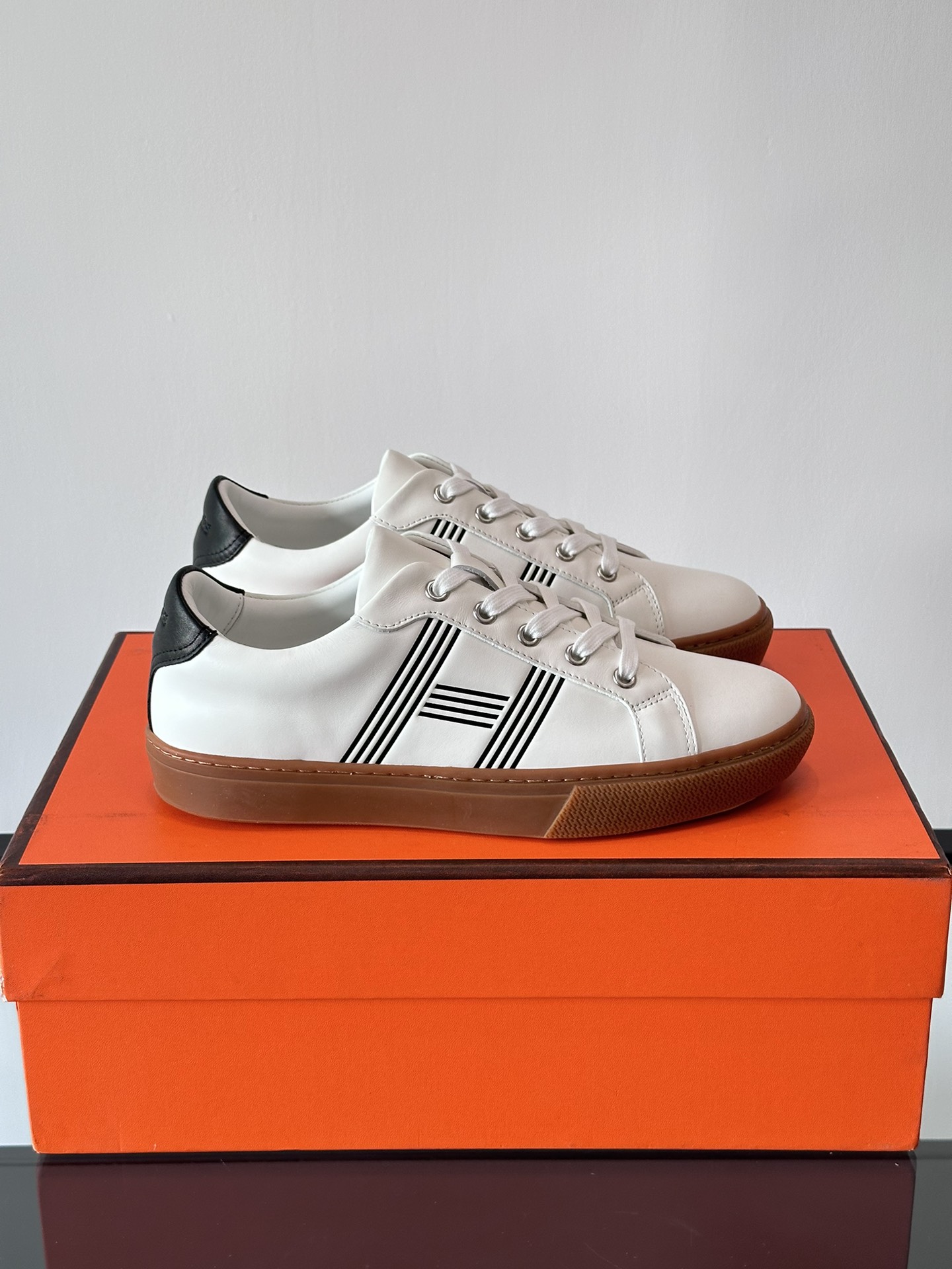 Hermes  Calfskin Mens Advantage Sneakers  White Black