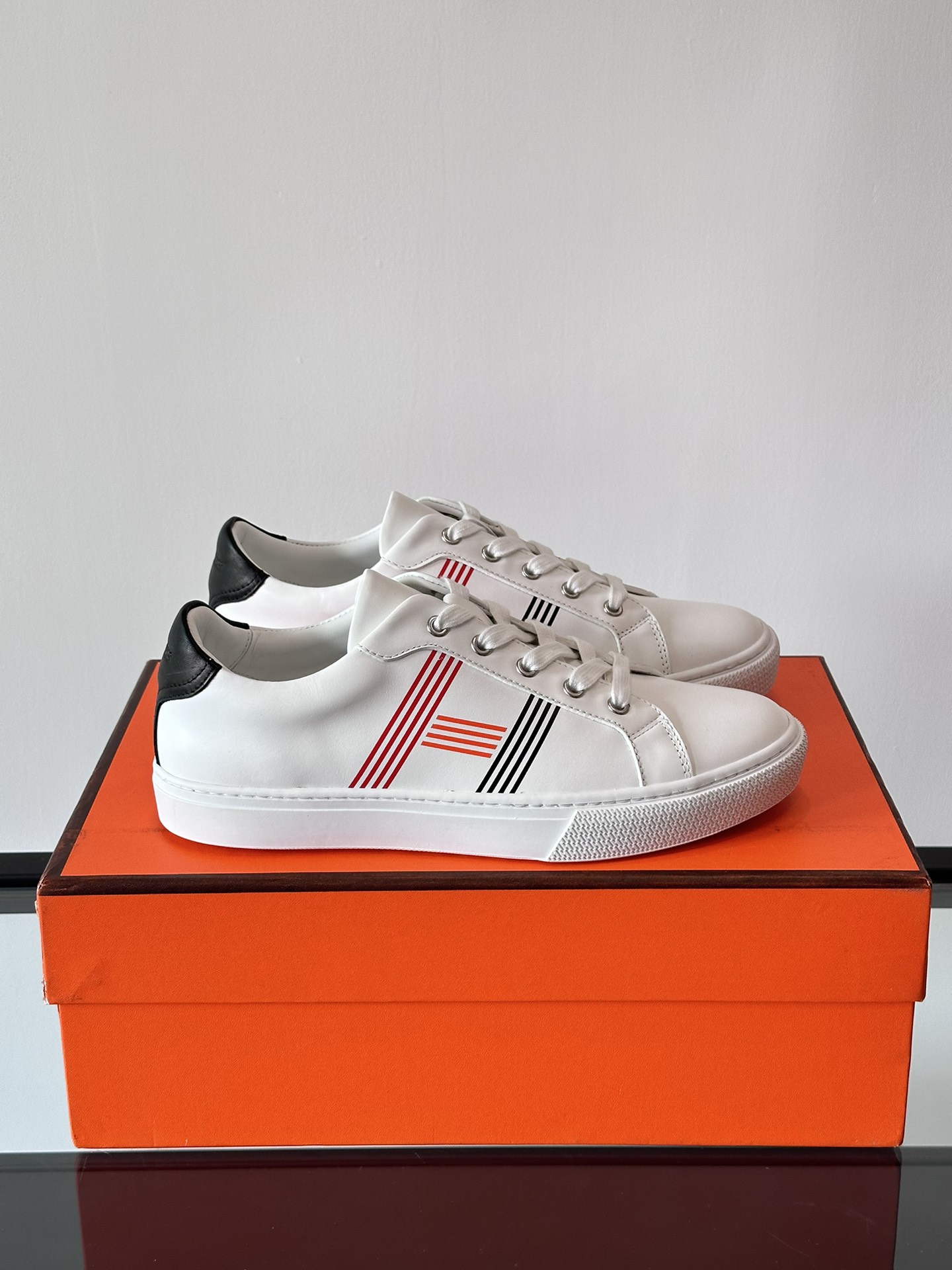 Hermes  Calfskin Mens Advantage Sneakers  White Multicolor