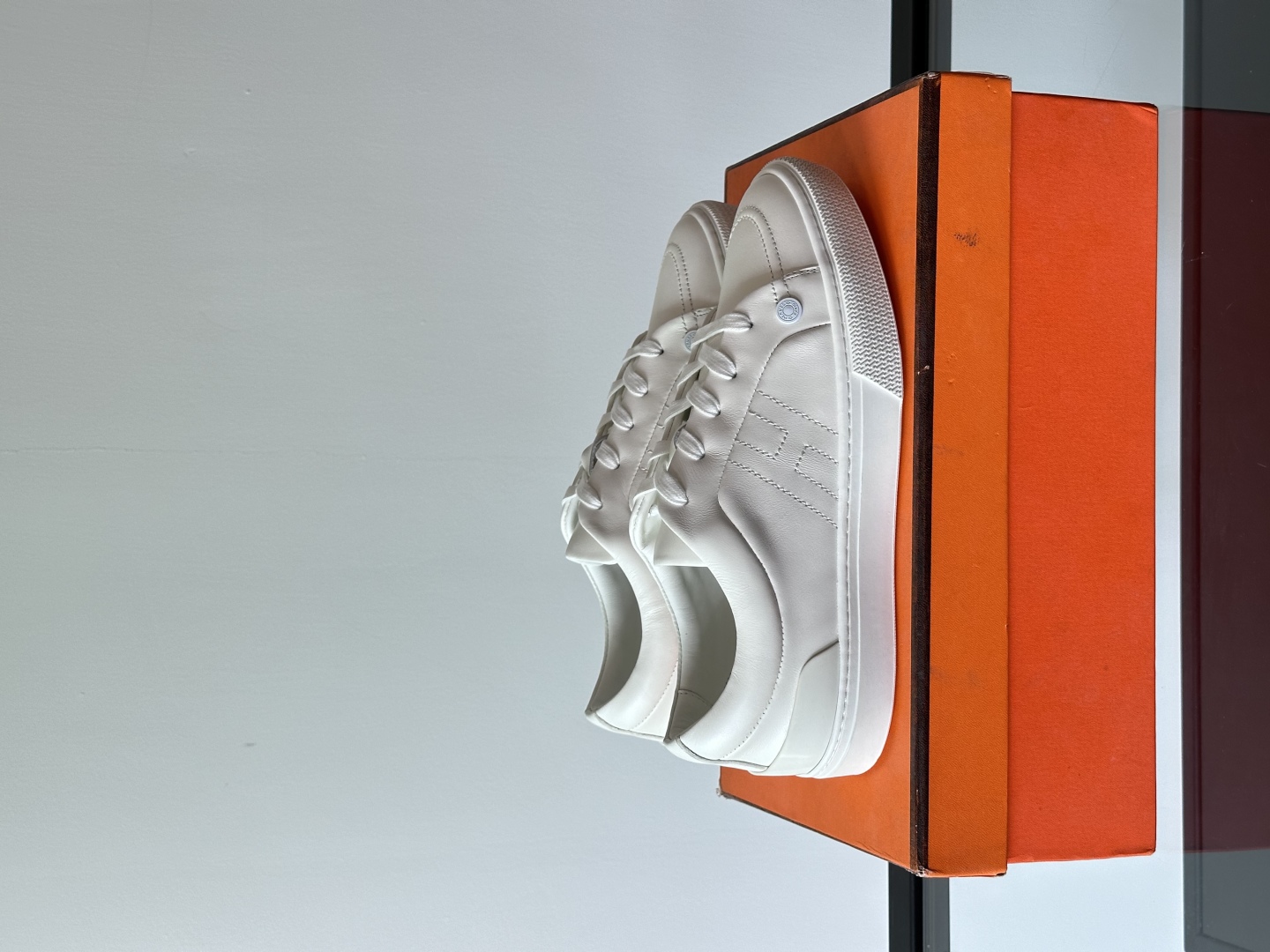 Hermès Clean White Leather Sneakers - Minimalist Design