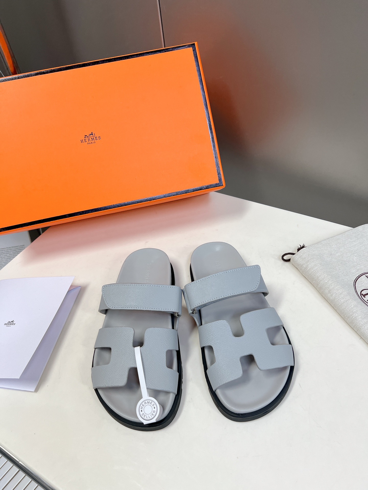 Hermès Light Gray Leather Slides