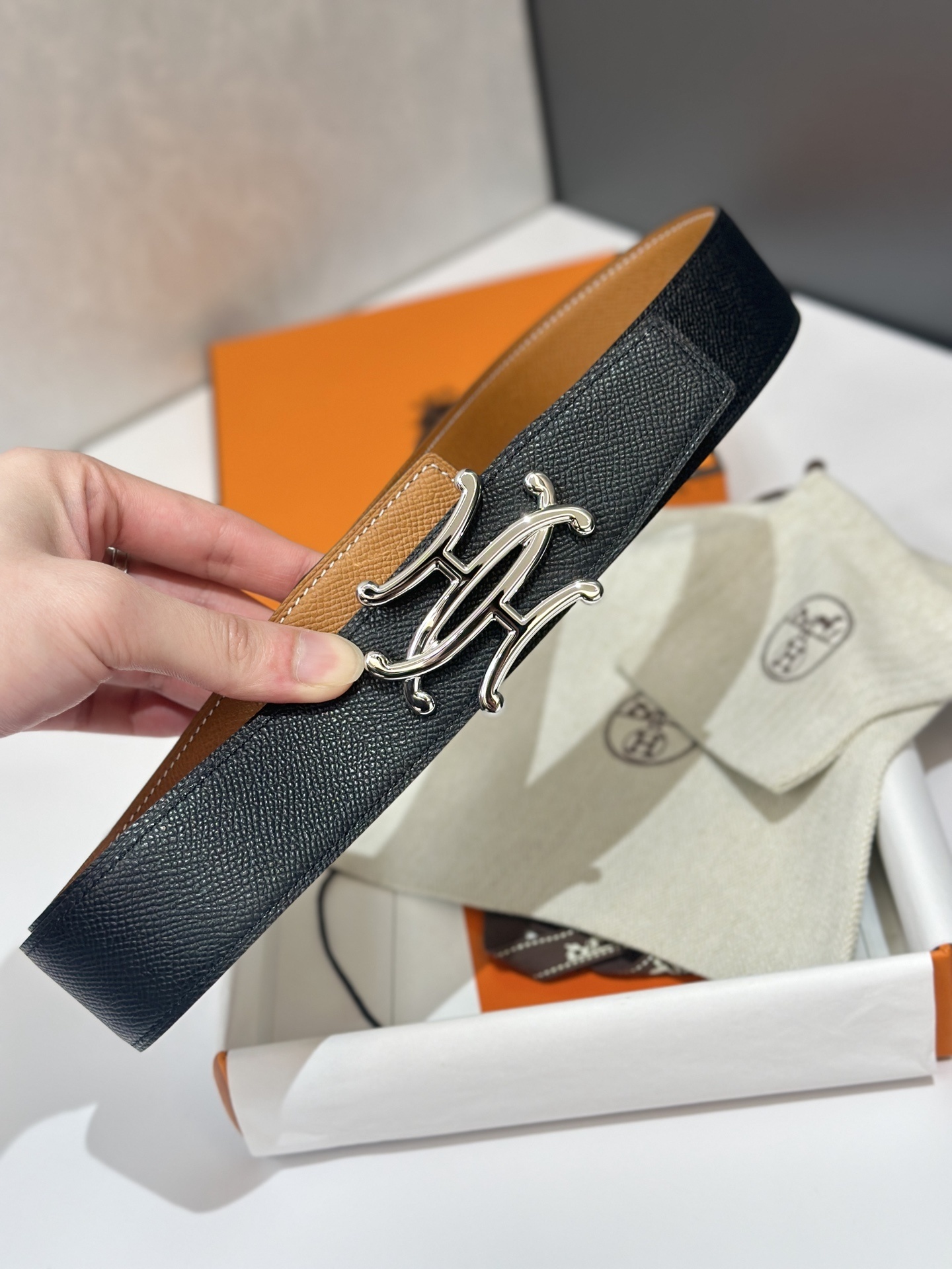 Luxury Hermès Reversible Leather Belt – Black & Tan with Silver Buckle