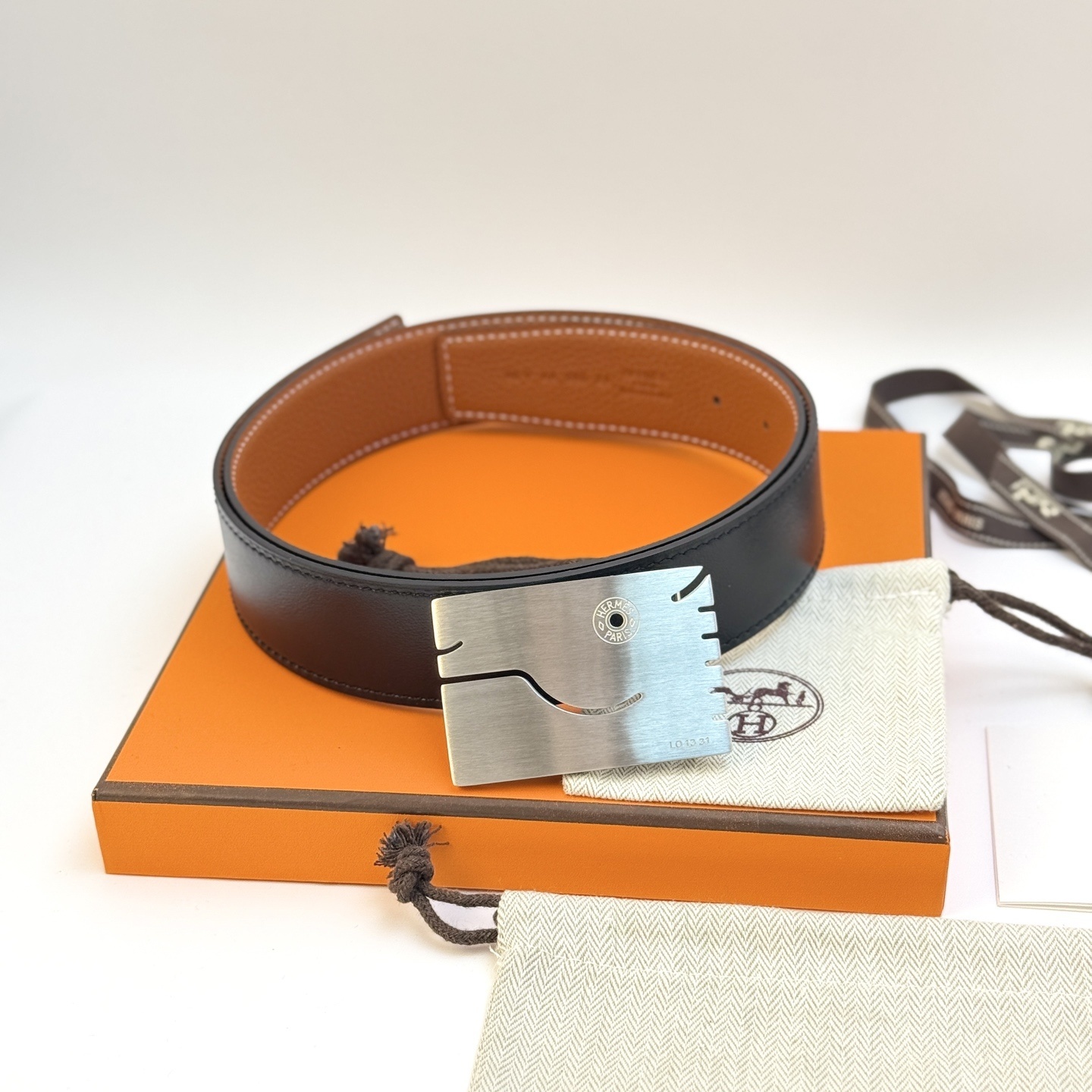 Hermès Reversible Leather Belt – Black/Tan with Brushed Silver Buckle