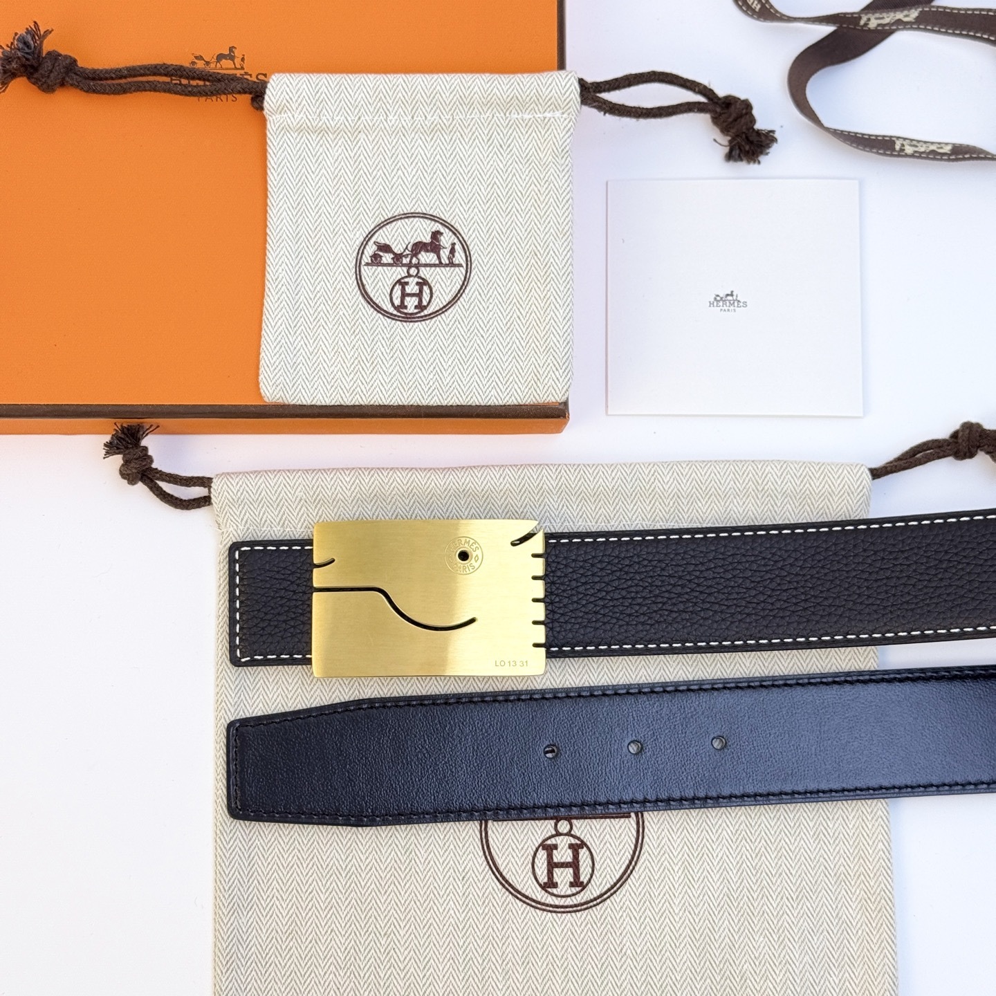 Hermès Men's Black Leather Belt with Unique Brushed Gold Buckle