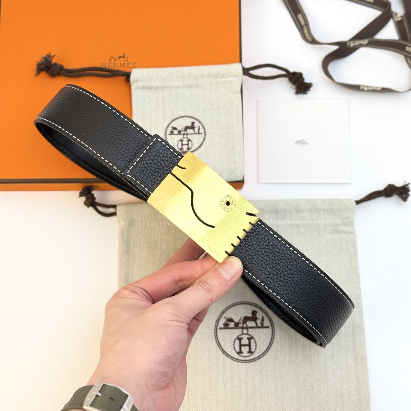 Hermès Men's Black Leather Belt with Unique Brushed Gold Buckle