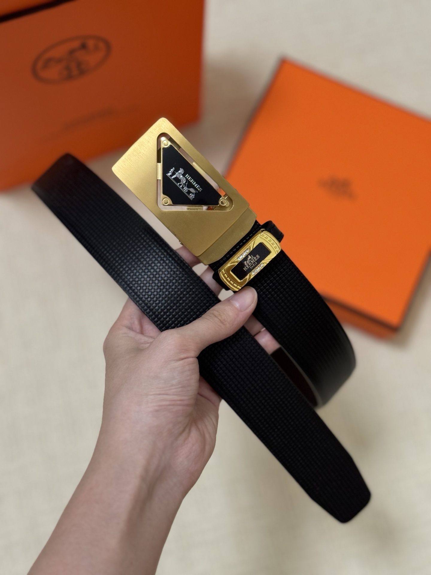 Hermès Men's Black Textured Leather Belt with Gold Triangle Buckle