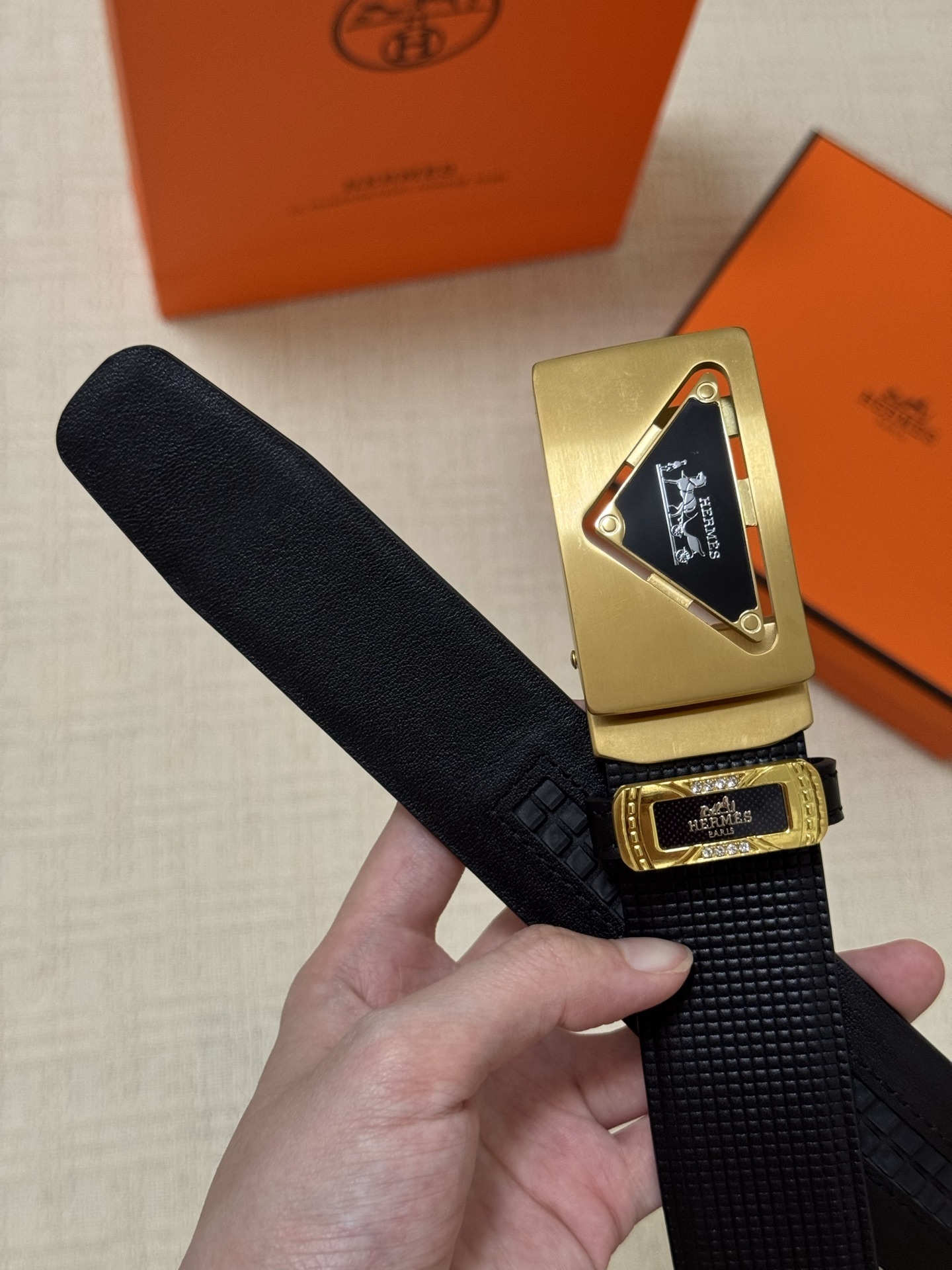 Hermès Men's Black Textured Leather Belt with Gold Triangle Buckle