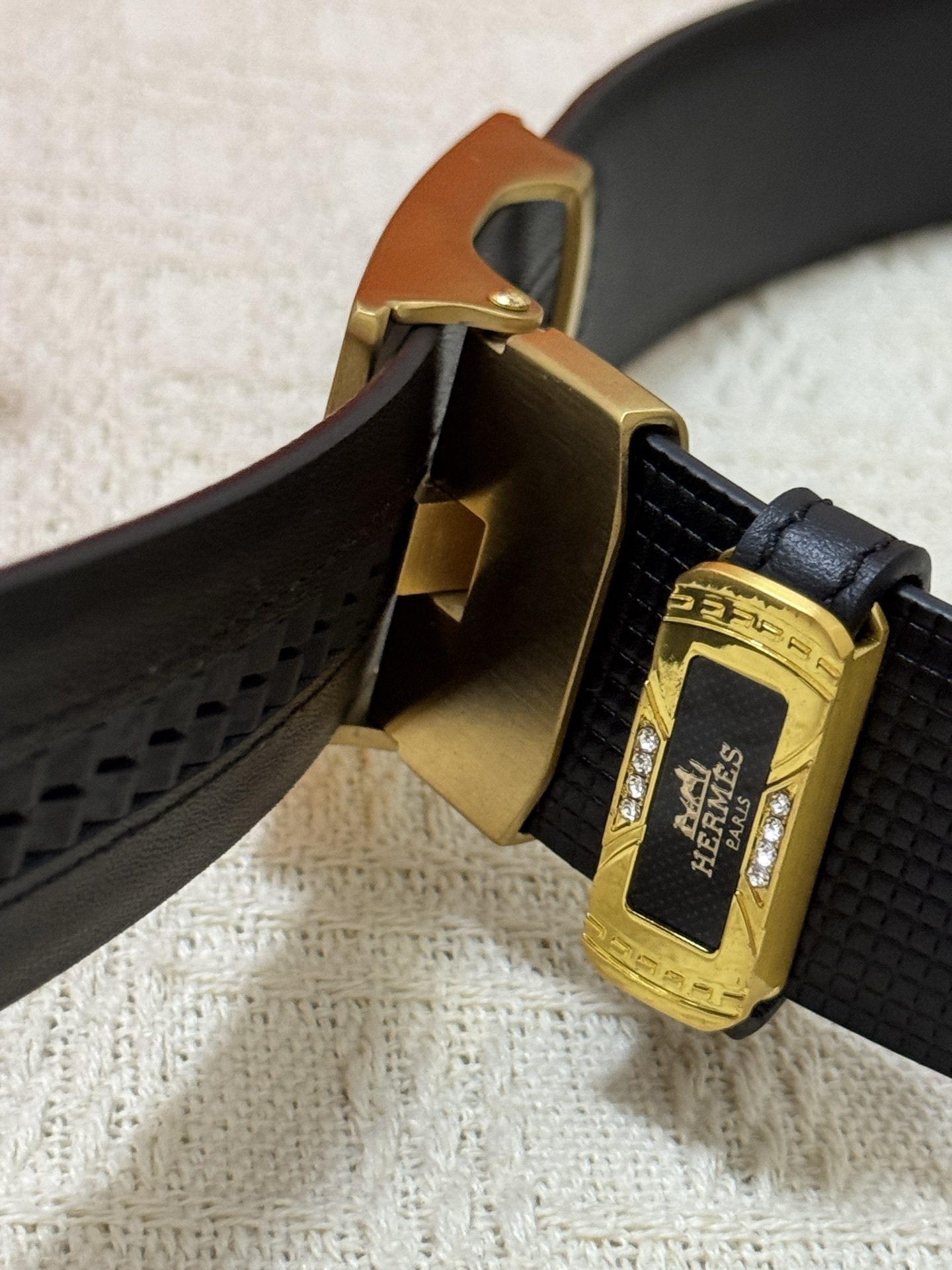 Hermès Men's Black Textured Leather Belt with Gold Triangle Buckle