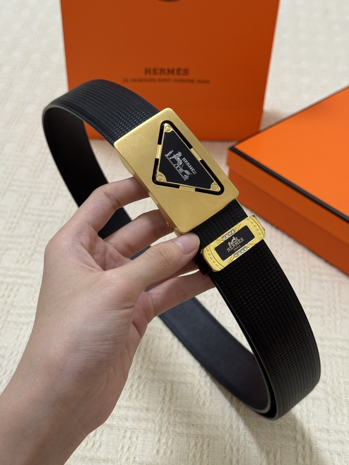 Hermès Men's Black Textured Leather Belt with Gold Triangle Buckle