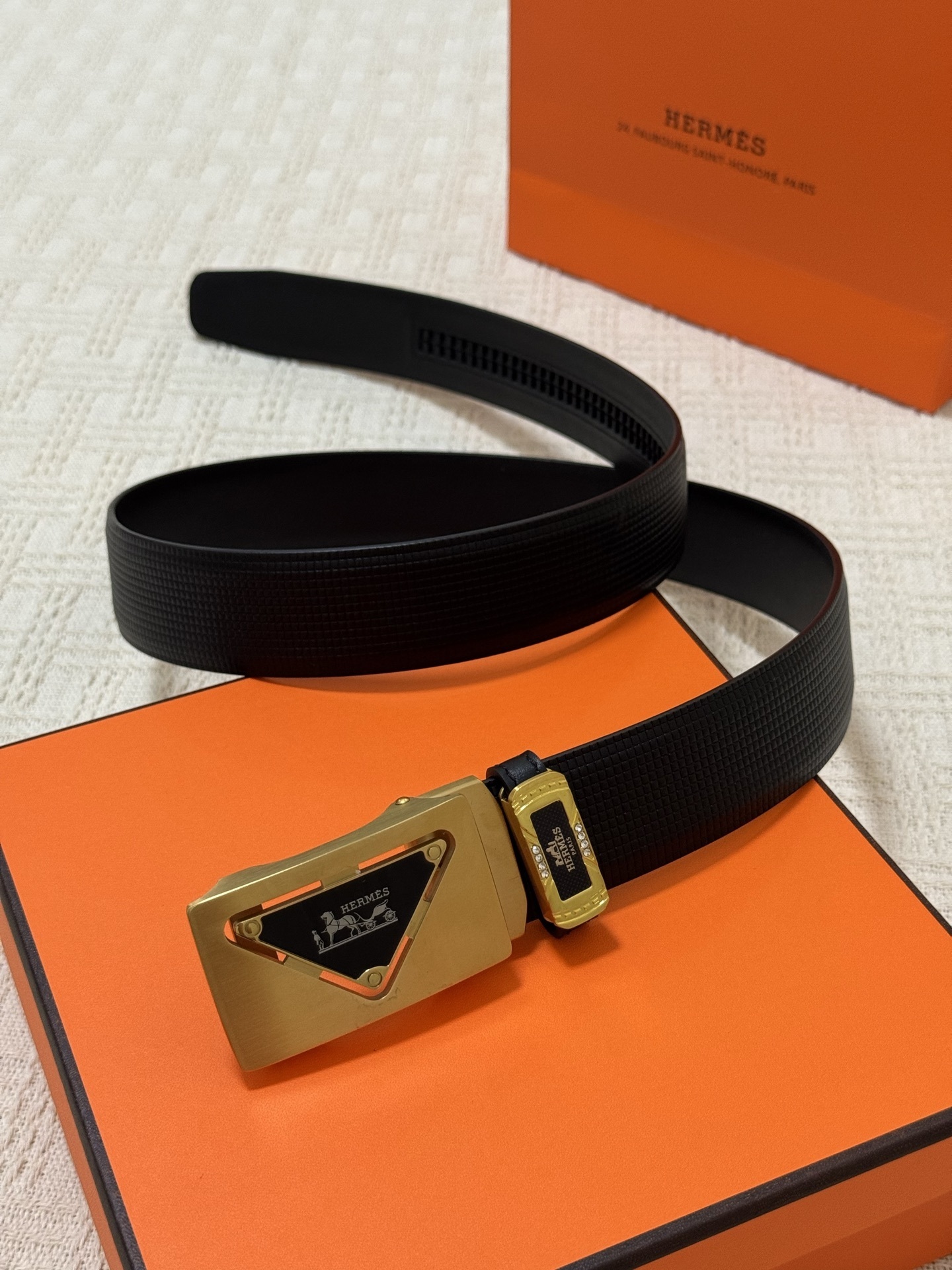Hermès Men's Black Textured Leather Belt with Gold Triangle Buckle