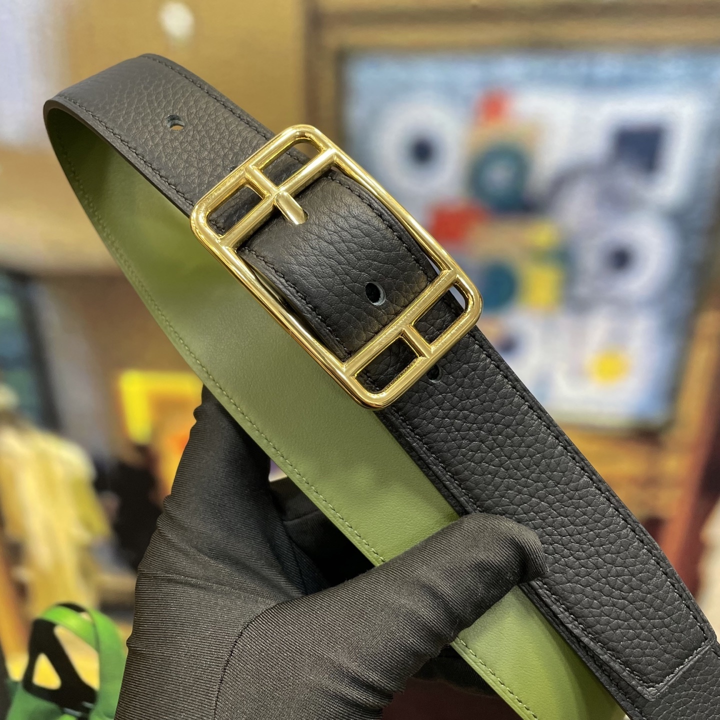 Elegant Designer Leather Belt with Iconic Stirrup Buckle