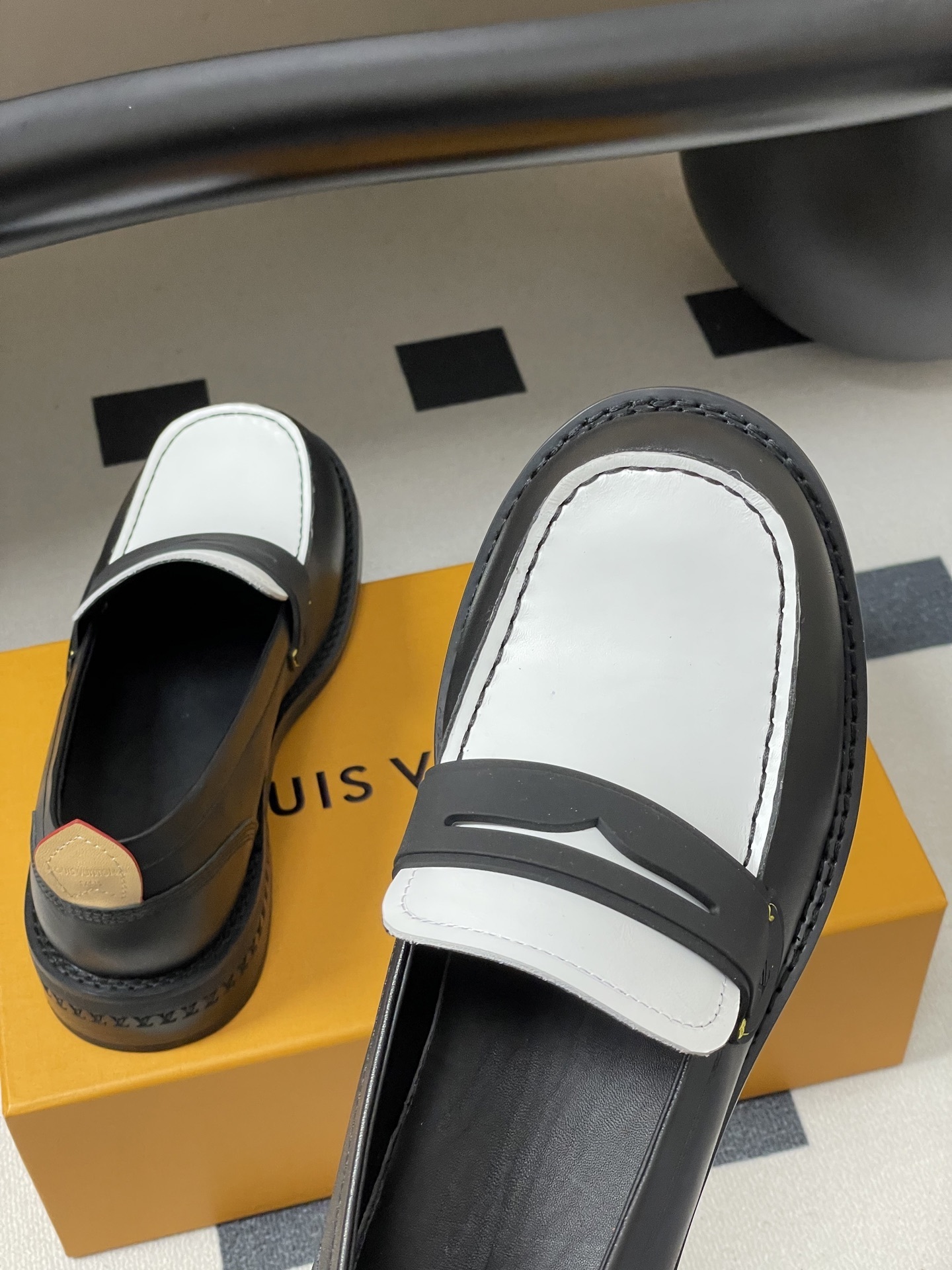 Louis Vuitton Black and White Leather Penny Loafers