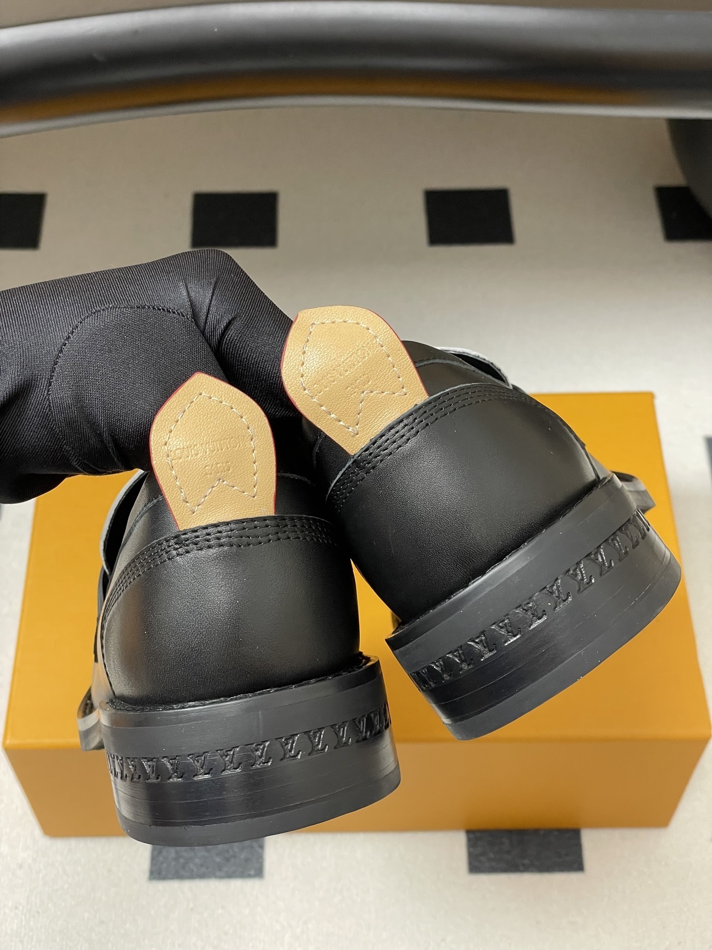 Louis Vuitton Black and White Leather Penny Loafers