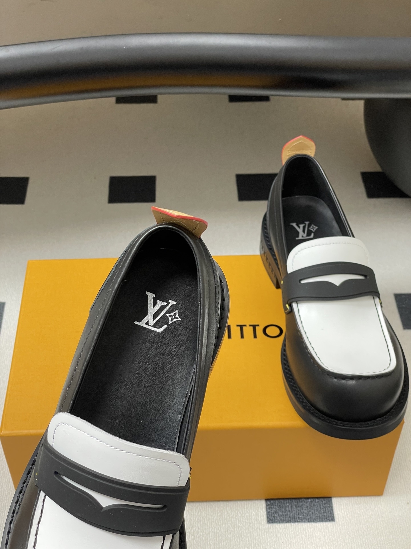 Louis Vuitton Black and White Leather Penny Loafers