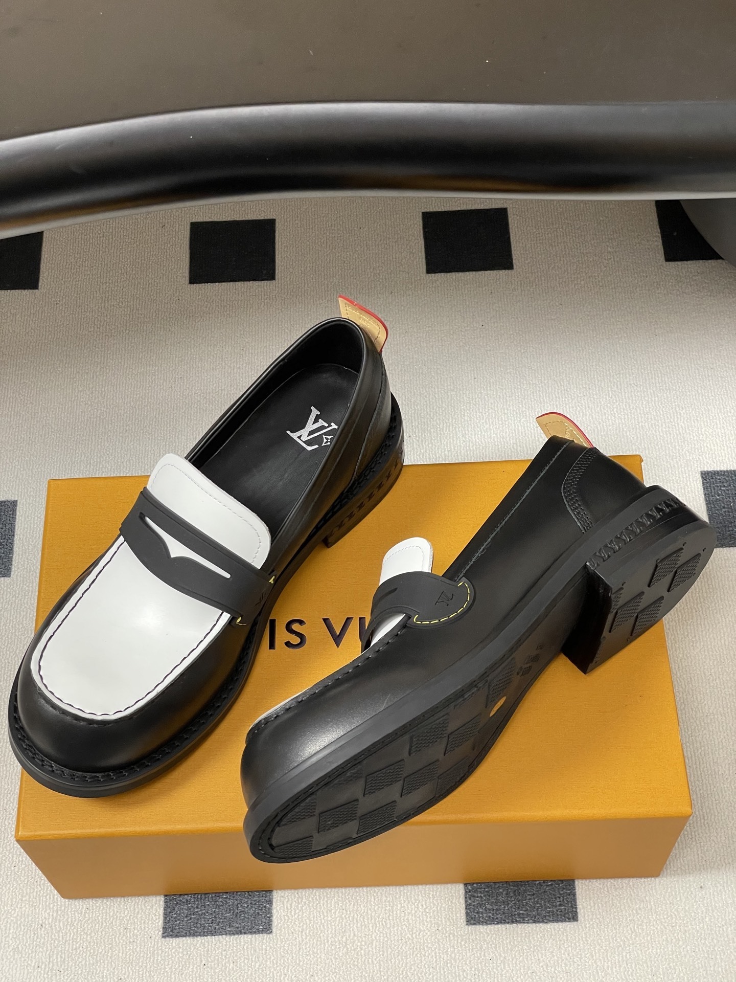 Louis Vuitton Black and White Leather Penny Loafers