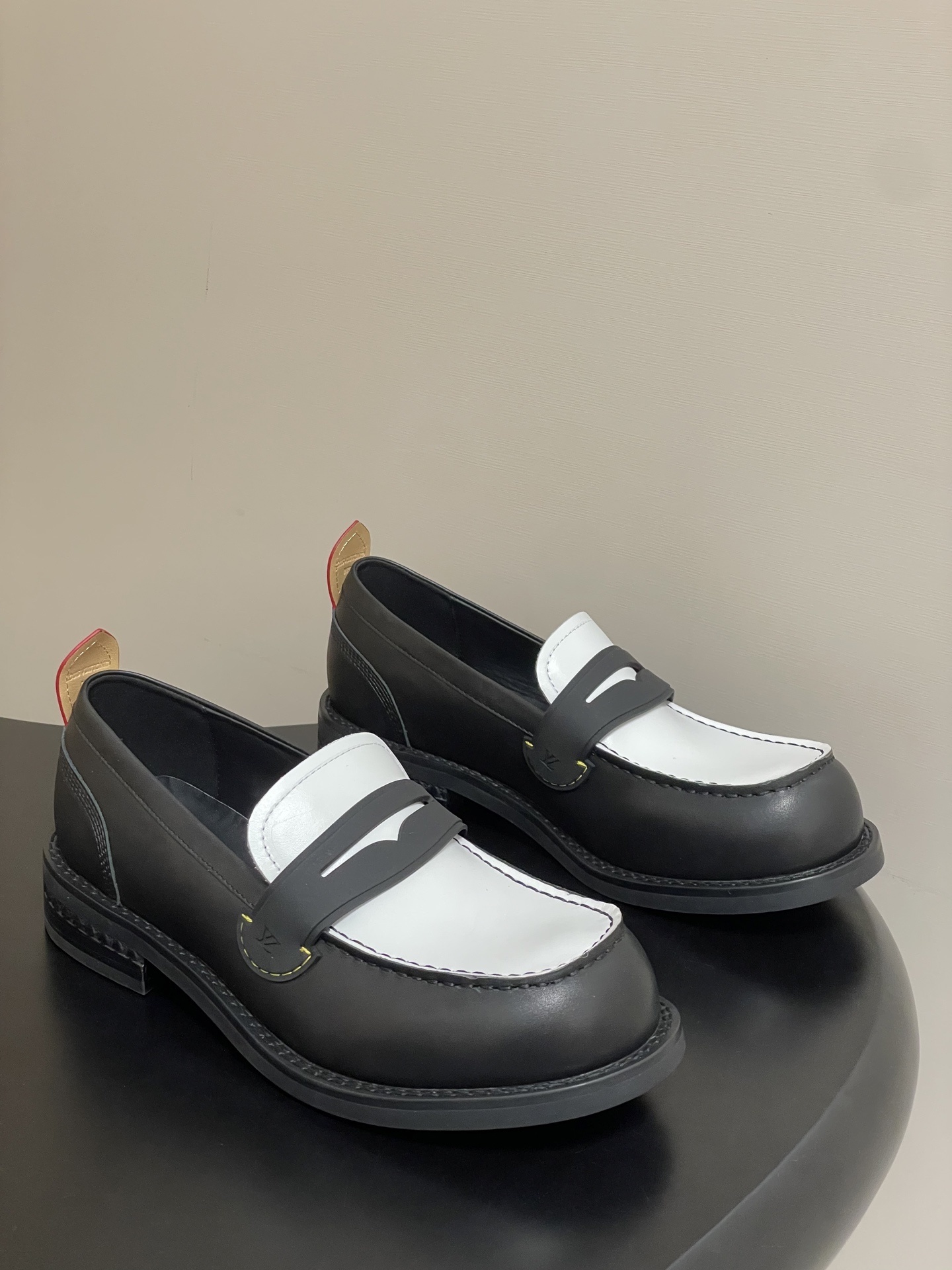 Louis Vuitton Black and White Leather Penny Loafers