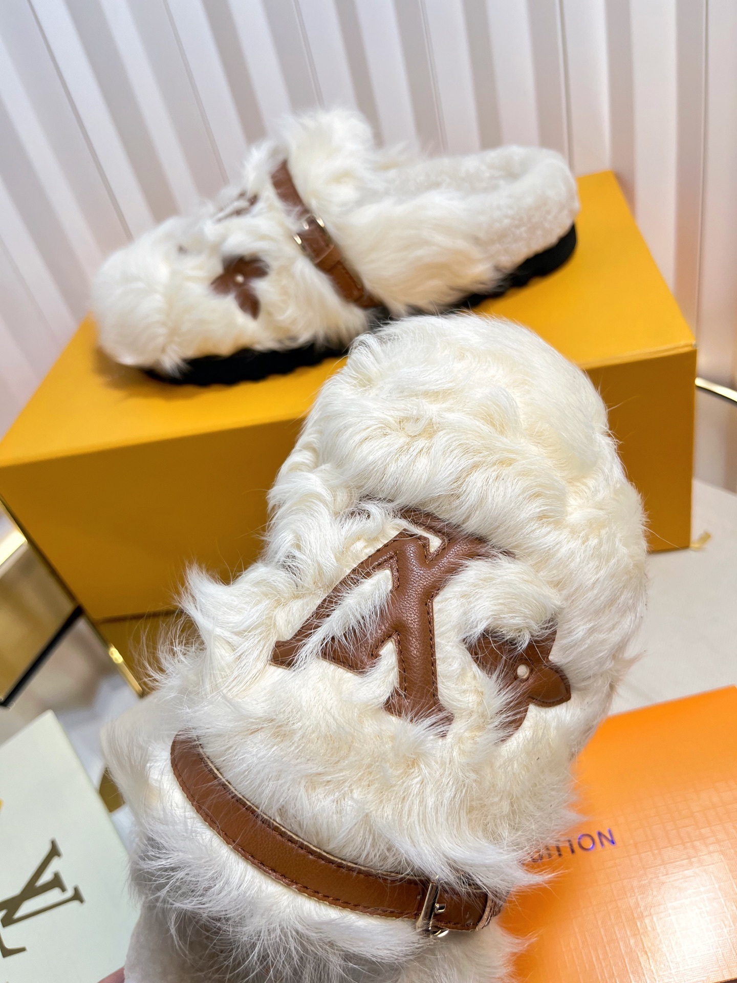 Louis Vuitton Paseo Flat Comfort Mule in White Shearling